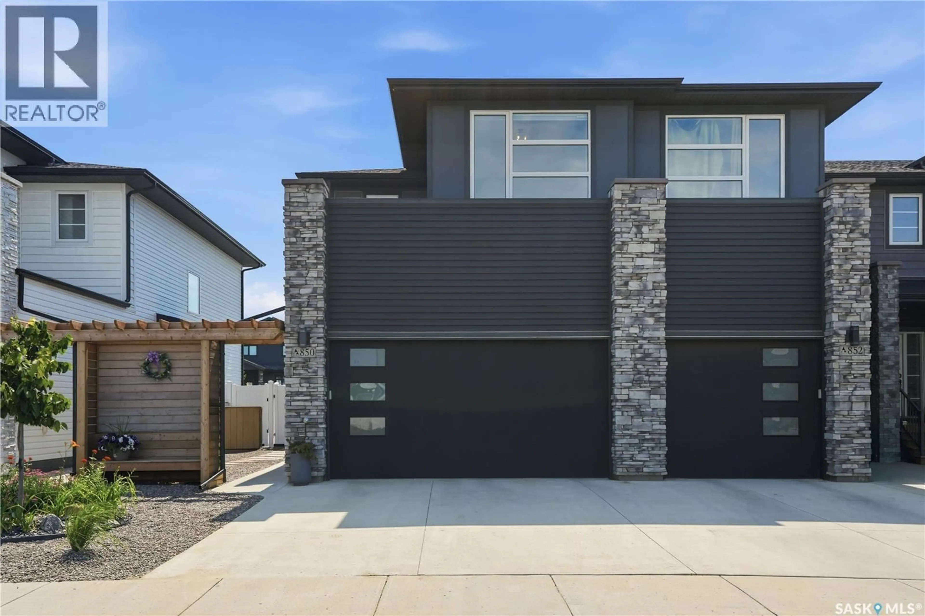 Home with brick exterior material, street for 850 BRIGHTON GATE, Saskatoon Saskatchewan S7V1L2