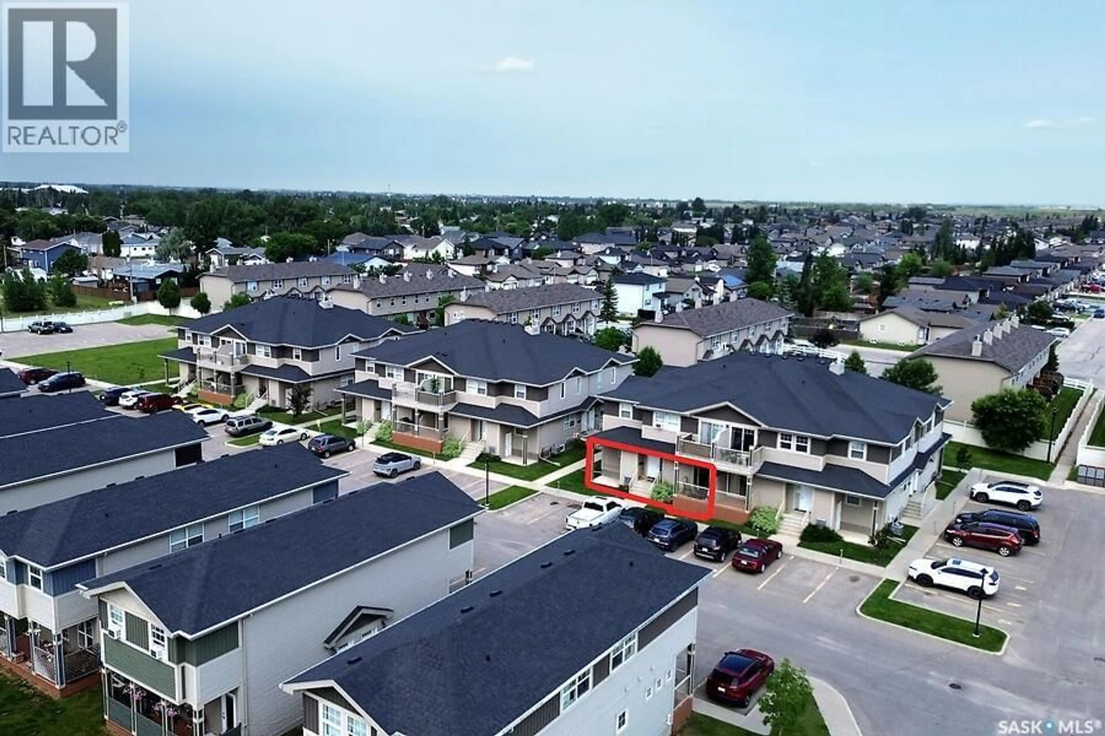 A pic from outside/outdoor area/front of a property/back of a property/a pic from drone, street for 202 100 CHAPARRAL BOULEVARD, Martensville Saskatchewan S0K0A2