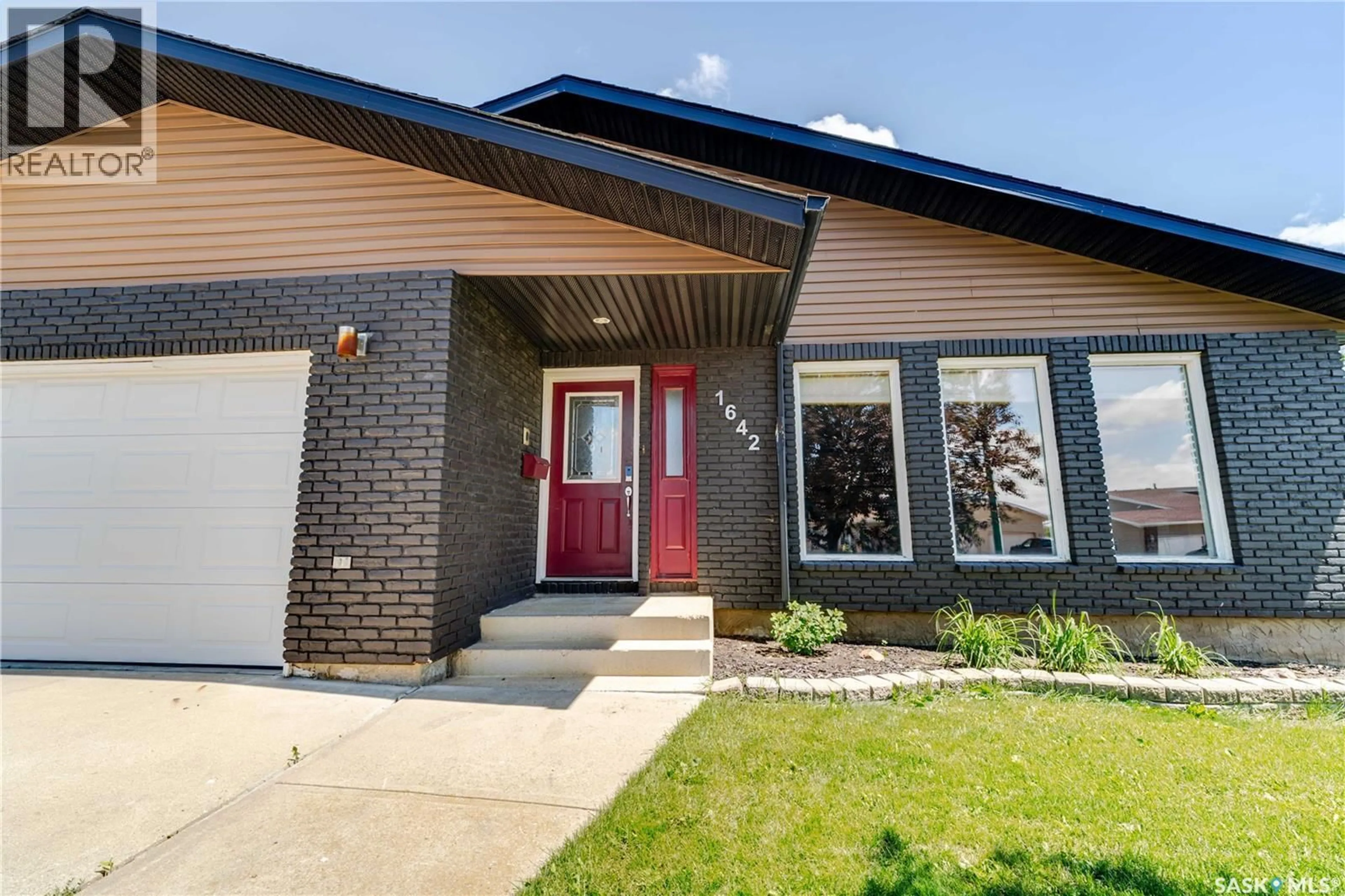 Home with brick exterior material, street for 1642 BINGHAM ROAD, Moose Jaw Saskatchewan S6H7R8