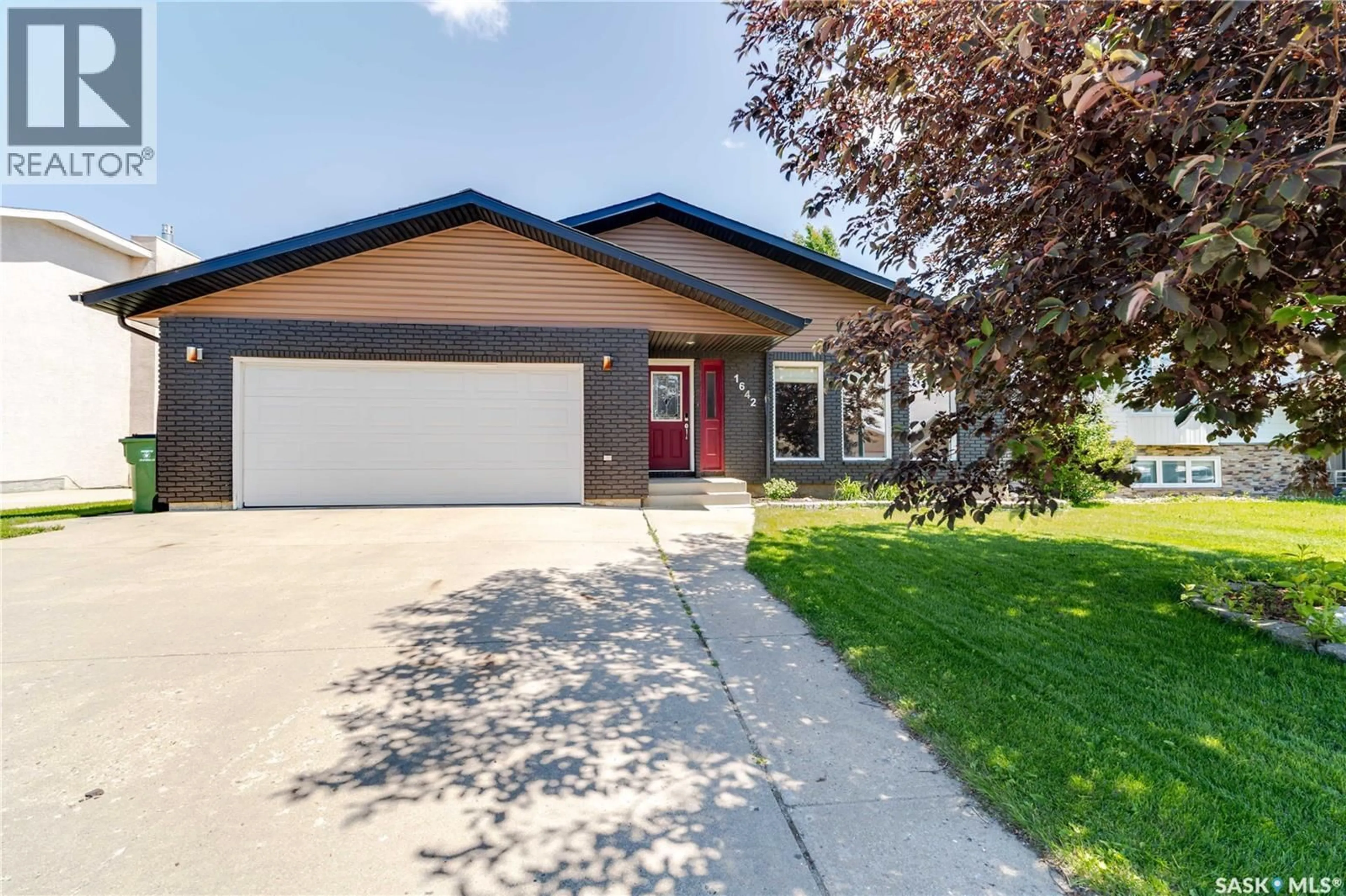 Home with vinyl exterior material, street for 1642 BINGHAM ROAD, Moose Jaw Saskatchewan S6H7R8