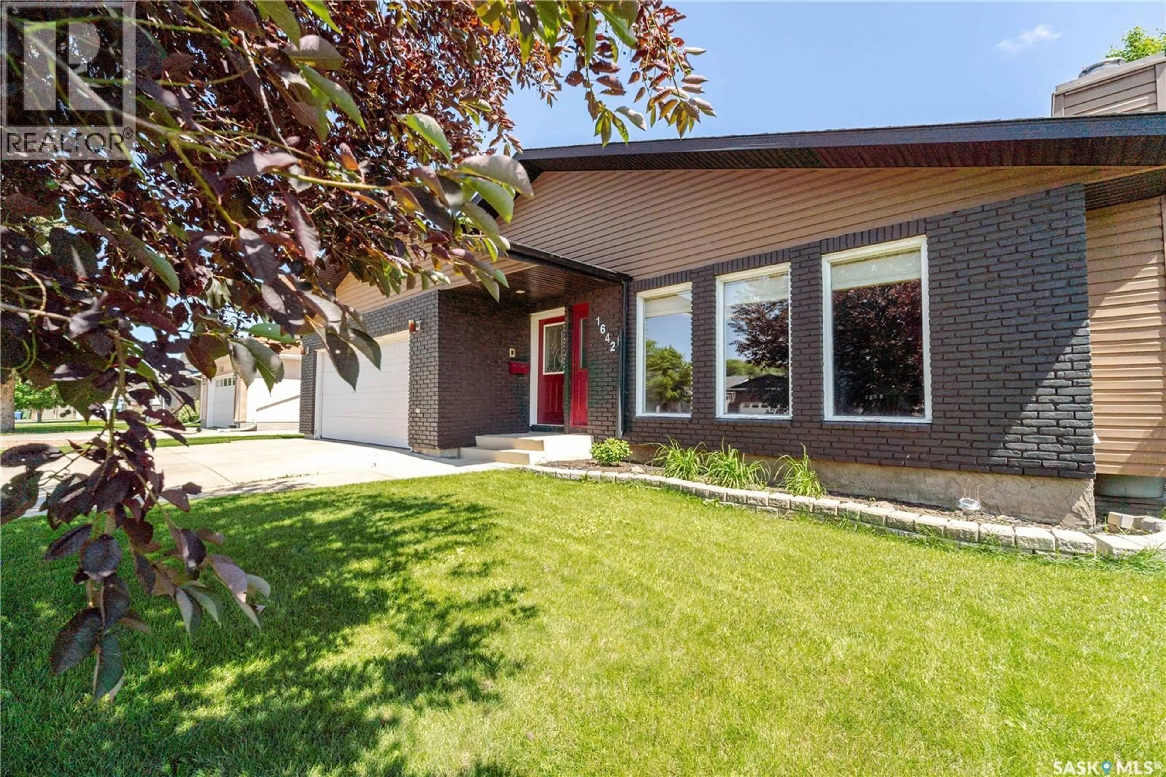 Home with vinyl exterior material, street for 1642 BINGHAM ROAD, Moose Jaw Saskatchewan S6H7R8