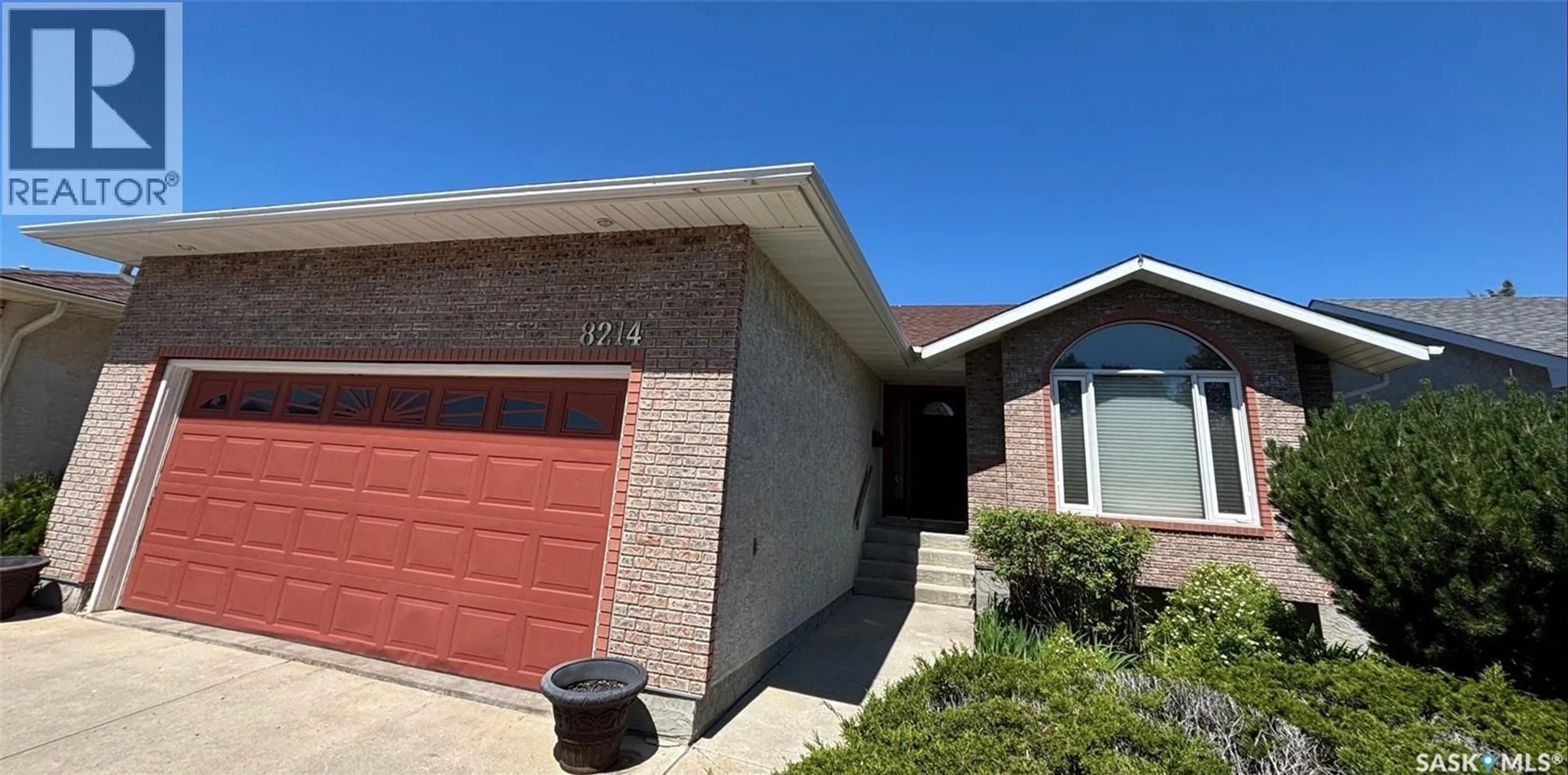 Home with brick exterior material, street for 8214 RANKIN DRIVE, Regina Saskatchewan S4Y1J4