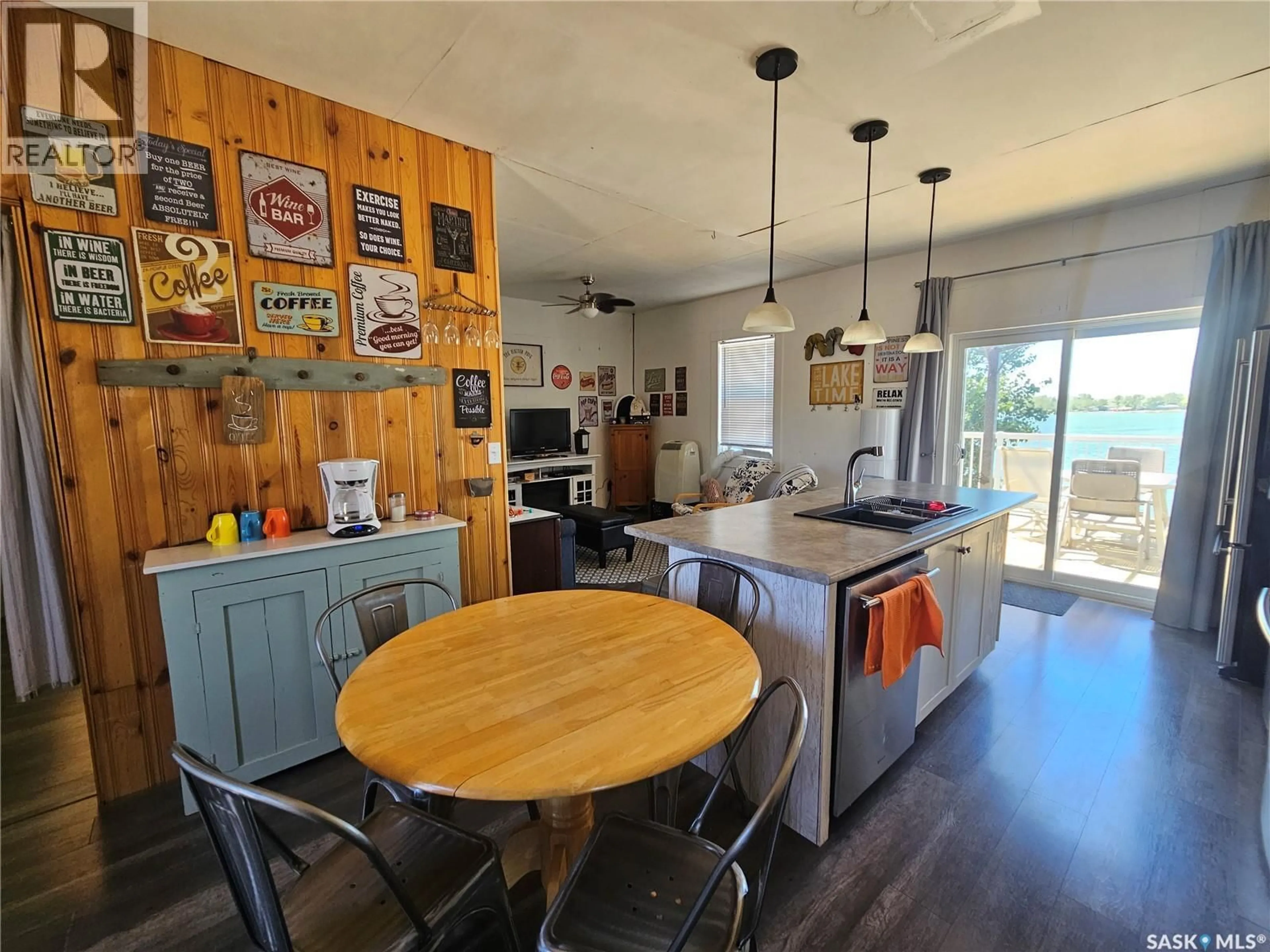Open concept kitchen, wood/laminate floor for Cabin - 157 CLEARWATER LAKE, Lacadena Rm No. 228 Saskatchewan S0L1T0