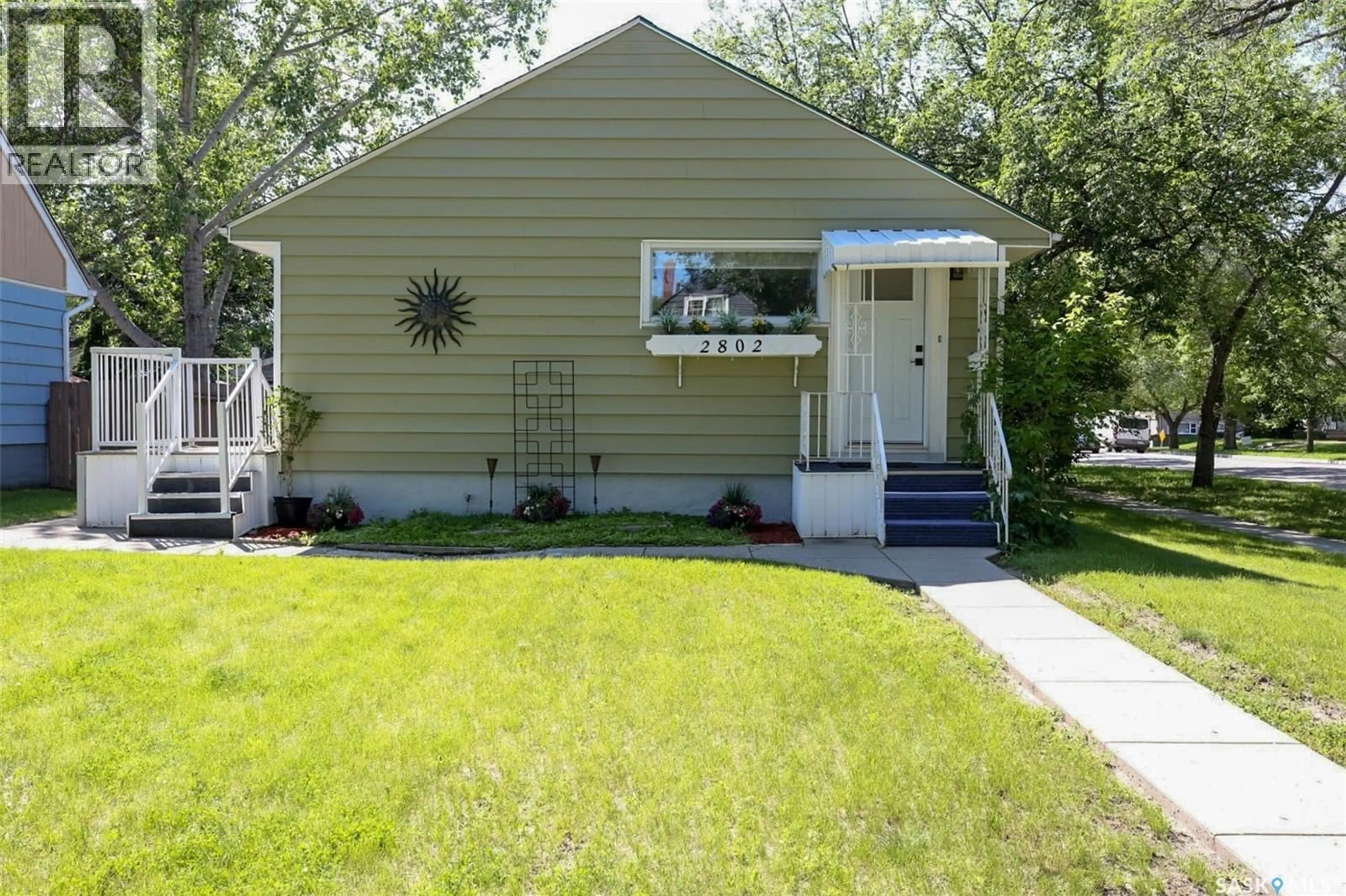 Home with vinyl exterior material, street for 2802 MCTAVISH STREET, Regina Saskatchewan S4S2C4