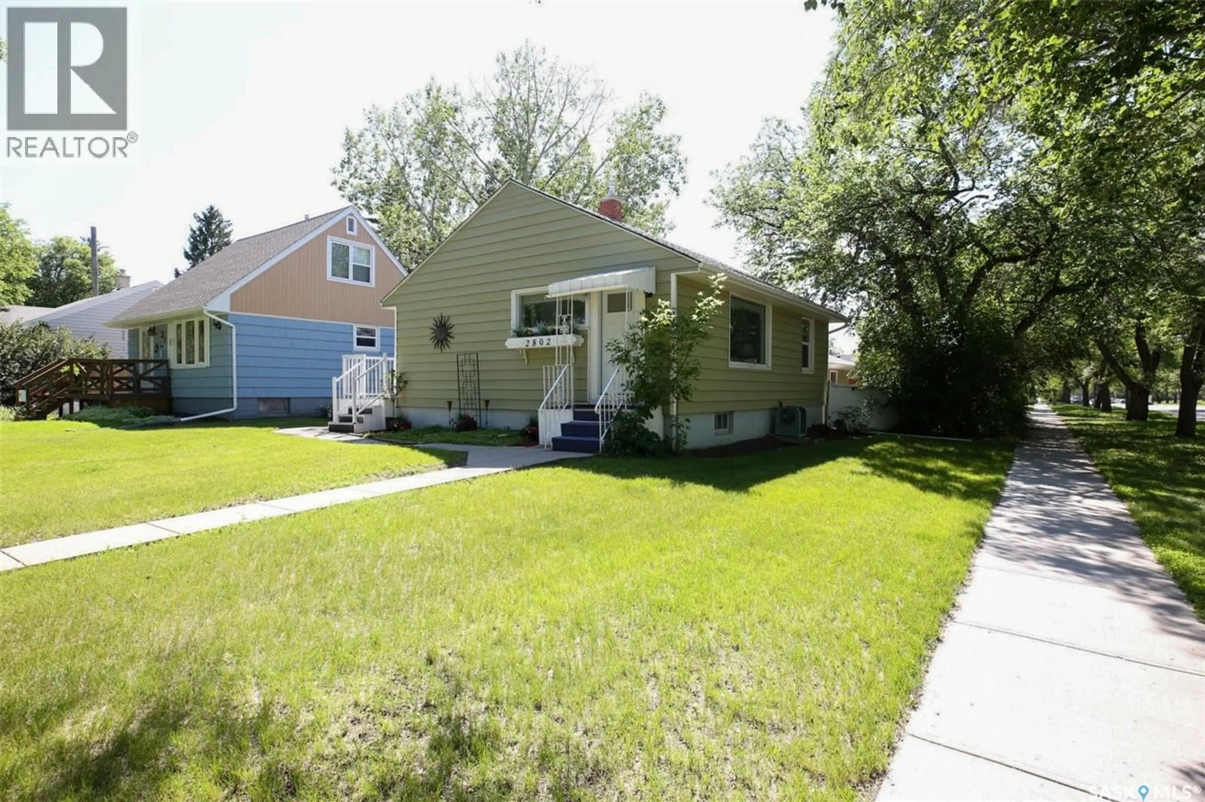 Home with vinyl exterior material, street for 2802 MCTAVISH STREET, Regina Saskatchewan S4S2C4