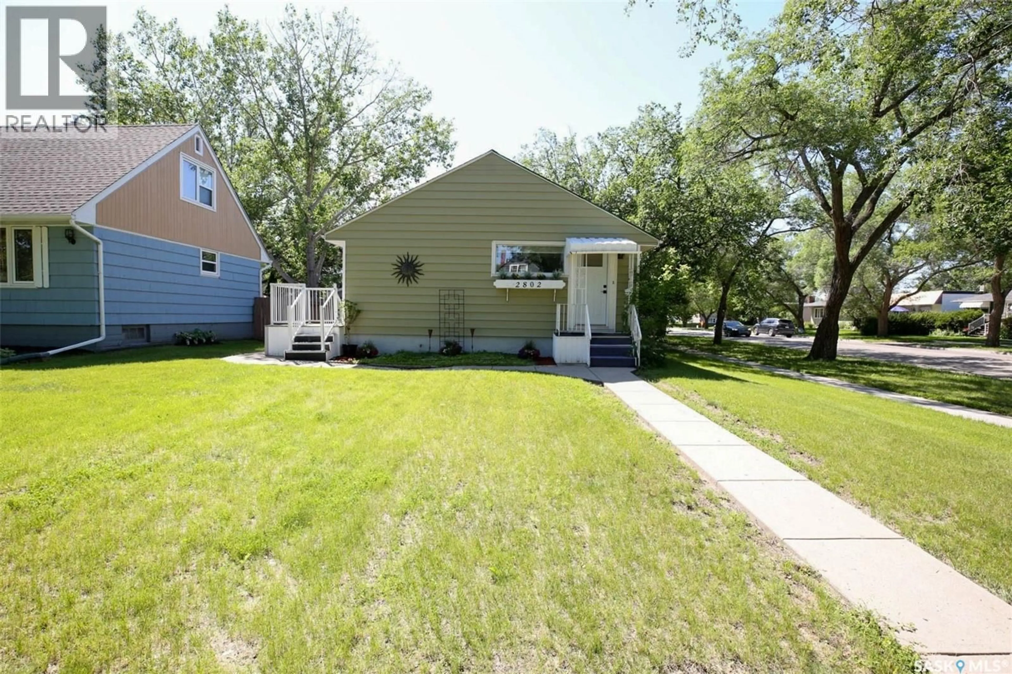 Home with vinyl exterior material, street for 2802 MCTAVISH STREET, Regina Saskatchewan S4S2C4
