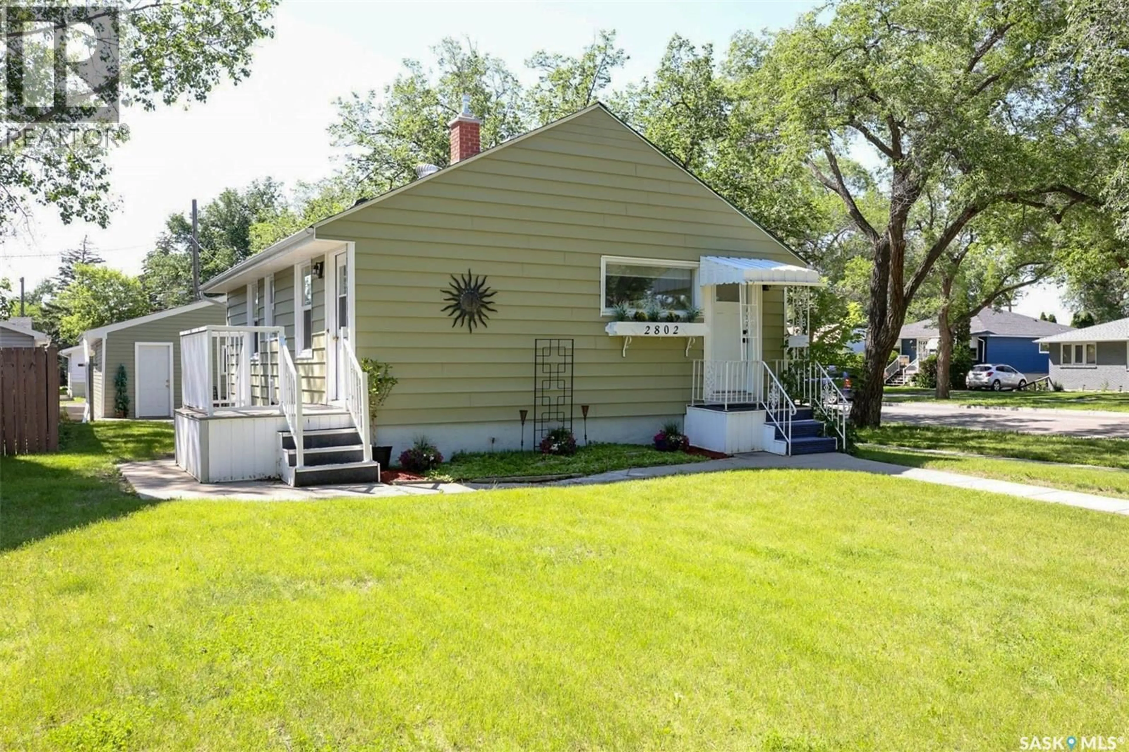 Home with vinyl exterior material, street for 2802 MCTAVISH STREET, Regina Saskatchewan S4S2C4
