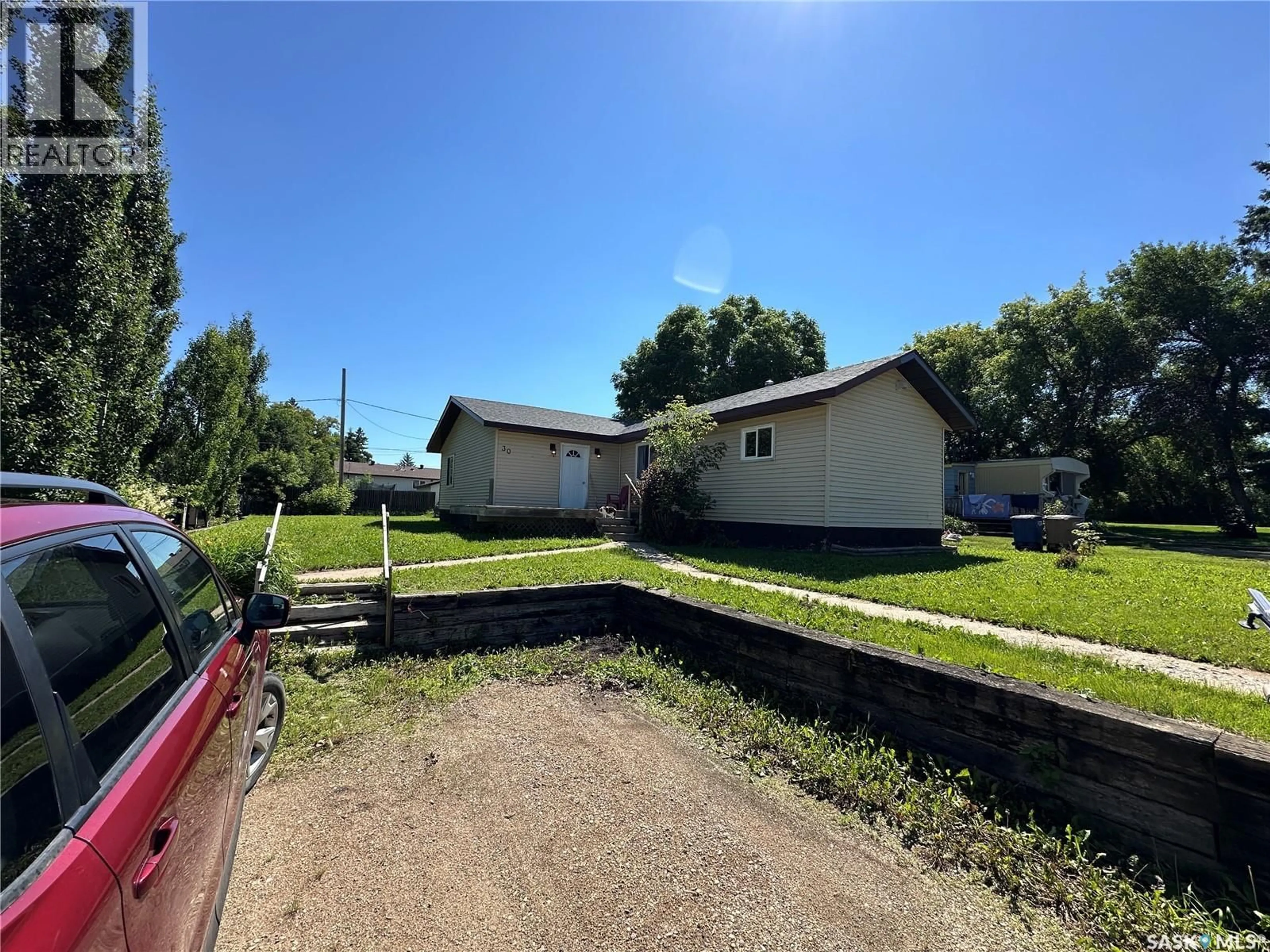 A pic from outside/outdoor area/front of a property/back of a property/a pic from drone, unknown for 30 1ST STREET, Birch Hills Saskatchewan S0J0G0