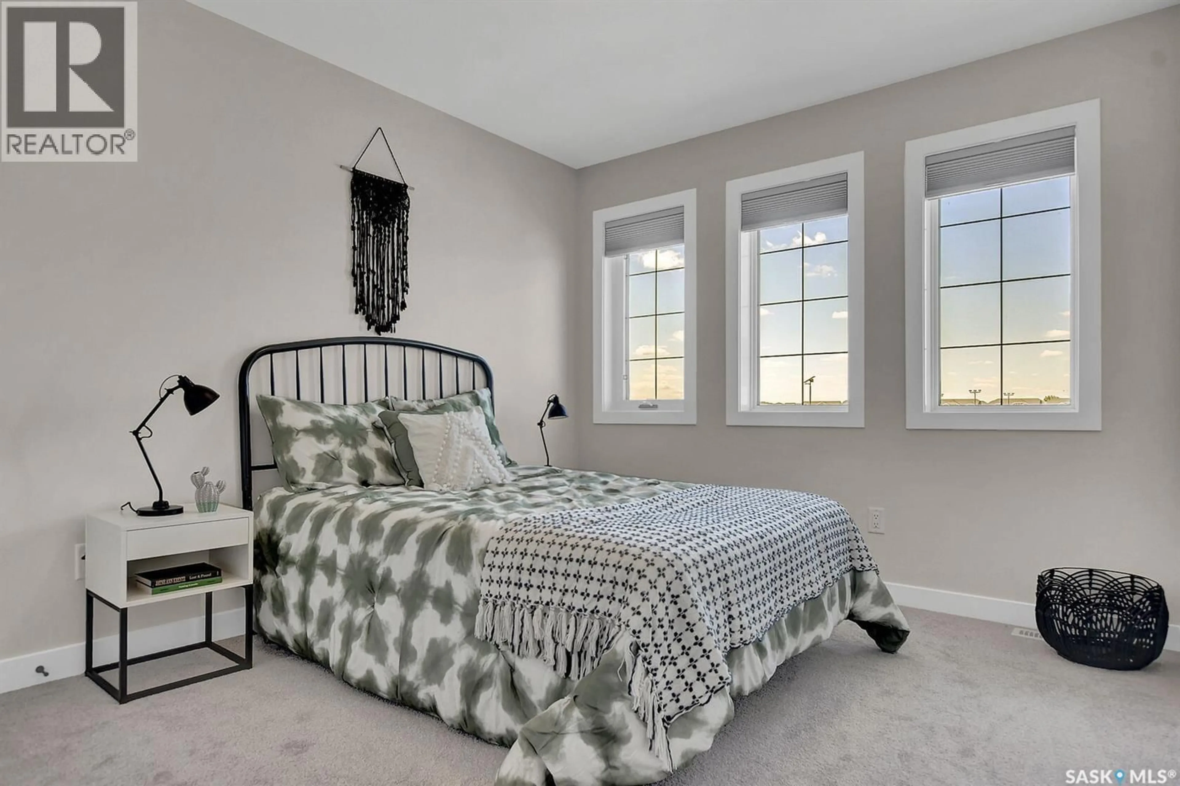 Bedroom with bed, carpet floor for 273 LAKESIDE BOULEVARD, Martensville Saskatchewan S0K2T1