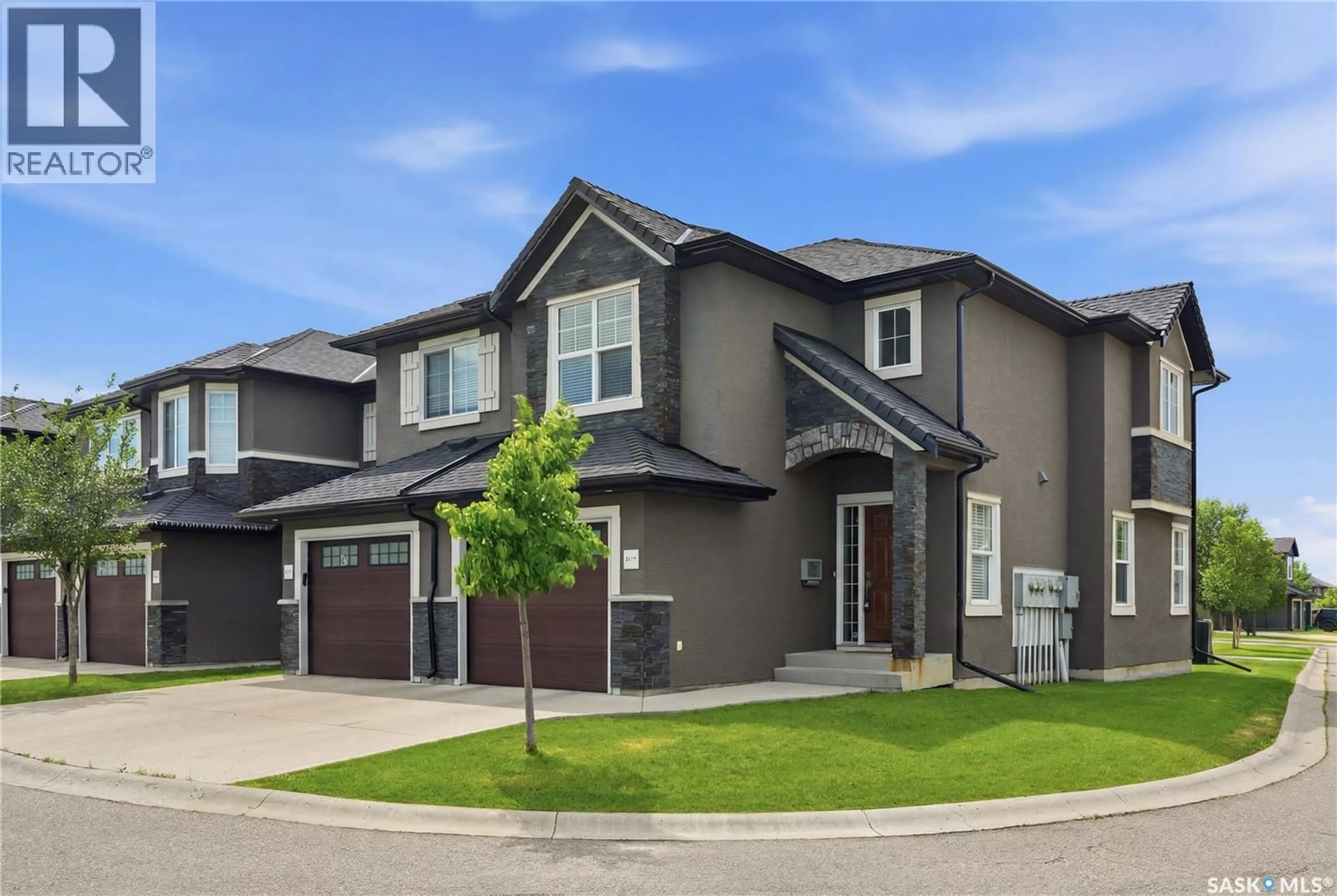 Home with vinyl exterior material, street for 311 1303 PATON CRESCENT, Saskatoon Saskatchewan S7W0P6