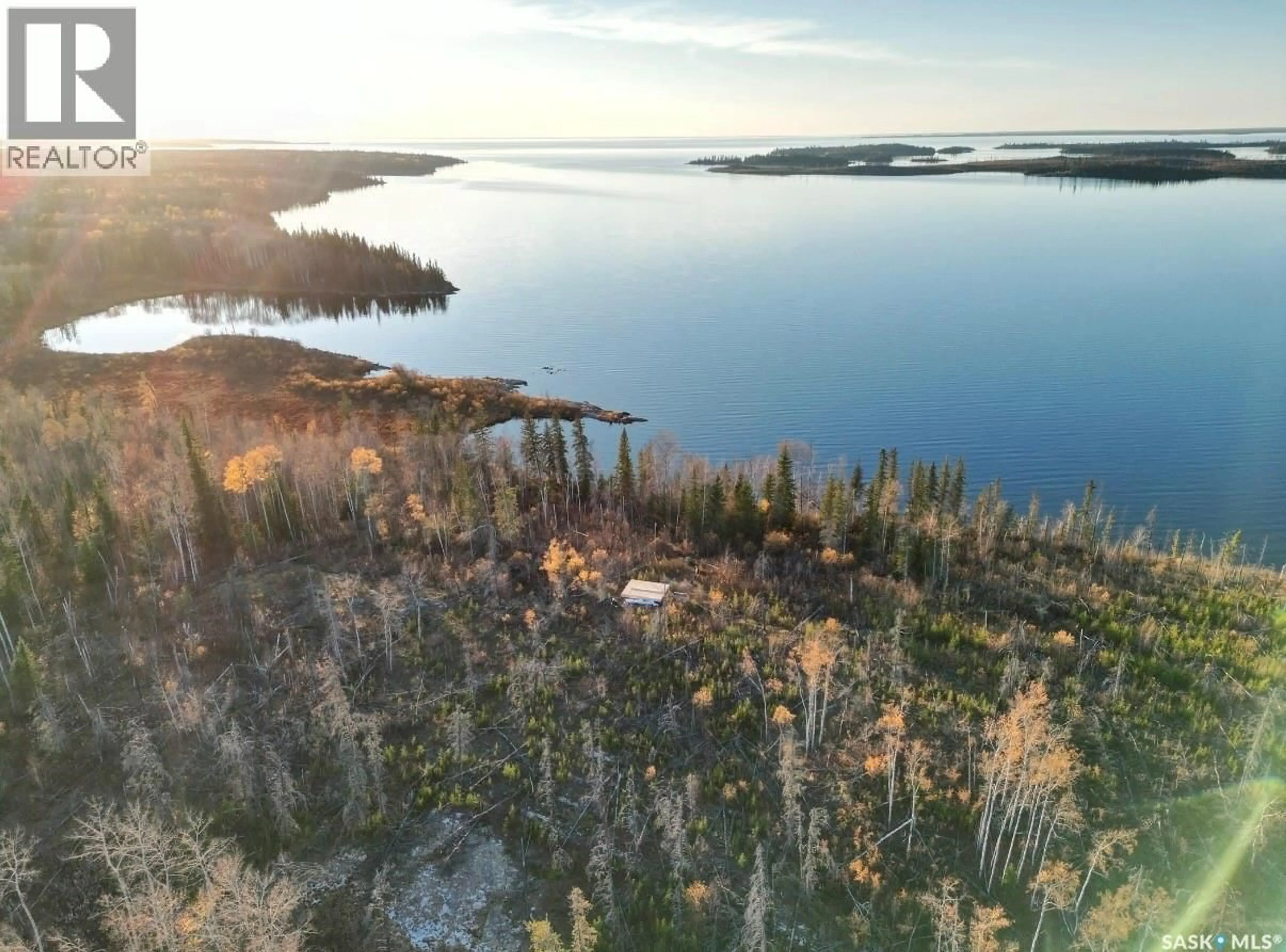 A pic from outside/outdoor area/front of a property/back of a property/a pic from drone, water/lake/river/ocean view for ABRAMS BAY, Lac La Ronge Provincial Park Saskatchewan S0J1L0