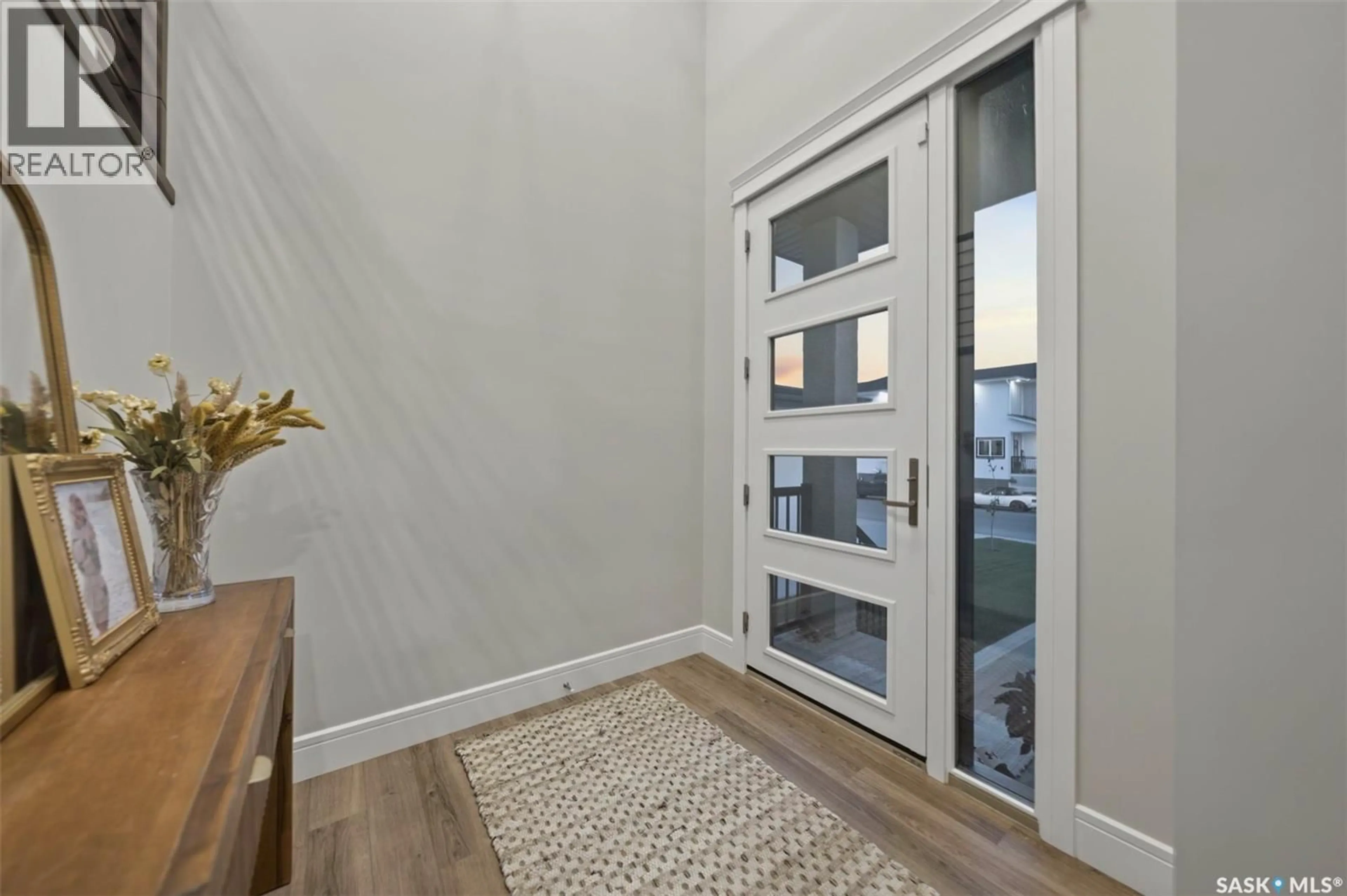 Indoor entryway for 119 WOOLF BEND, Saskatoon Saskatchewan S7W1E6