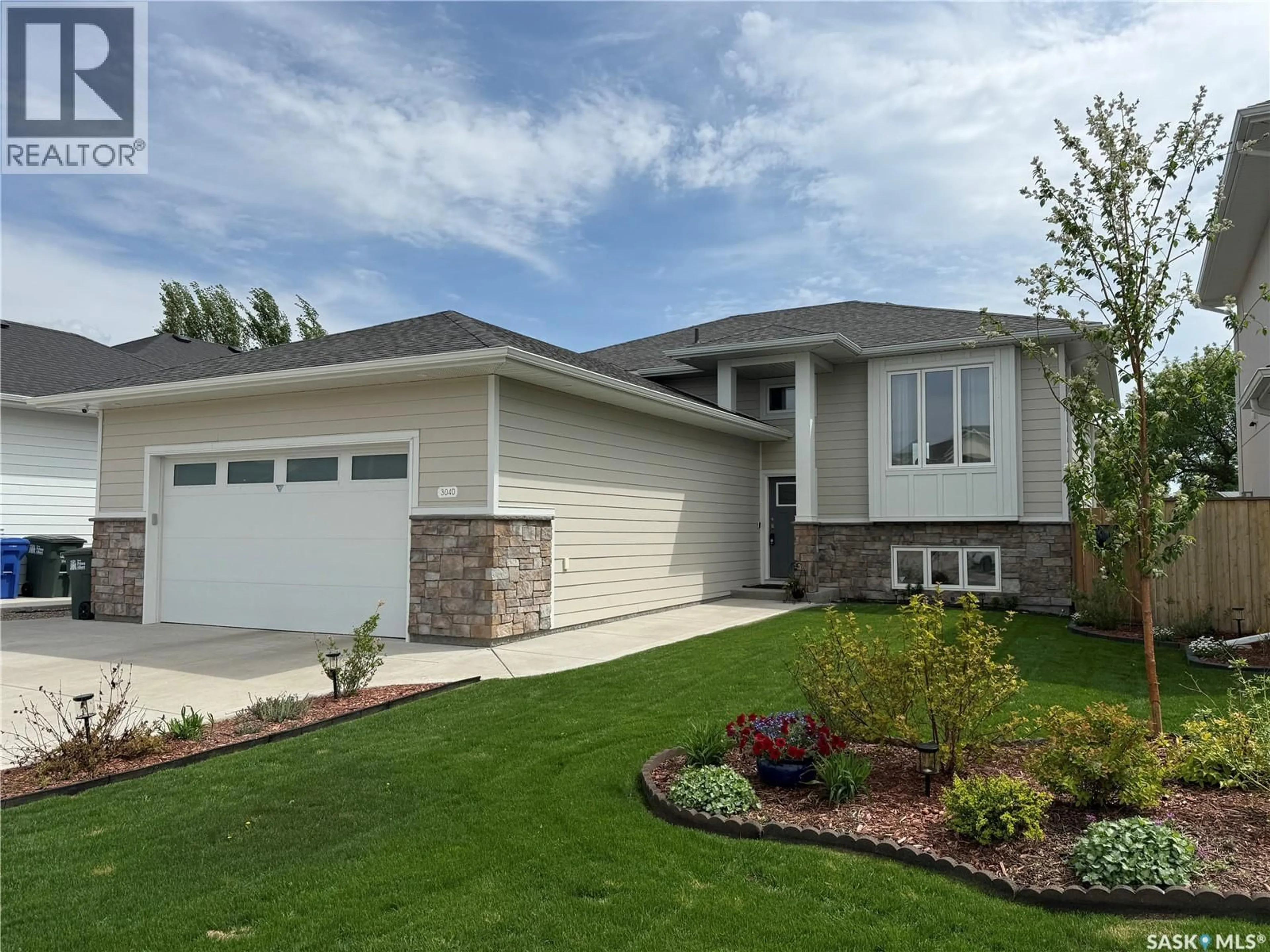 Home with vinyl exterior material, street for 3040 LAKEVIEW DRIVE, Prince Albert Saskatchewan S6W0A4