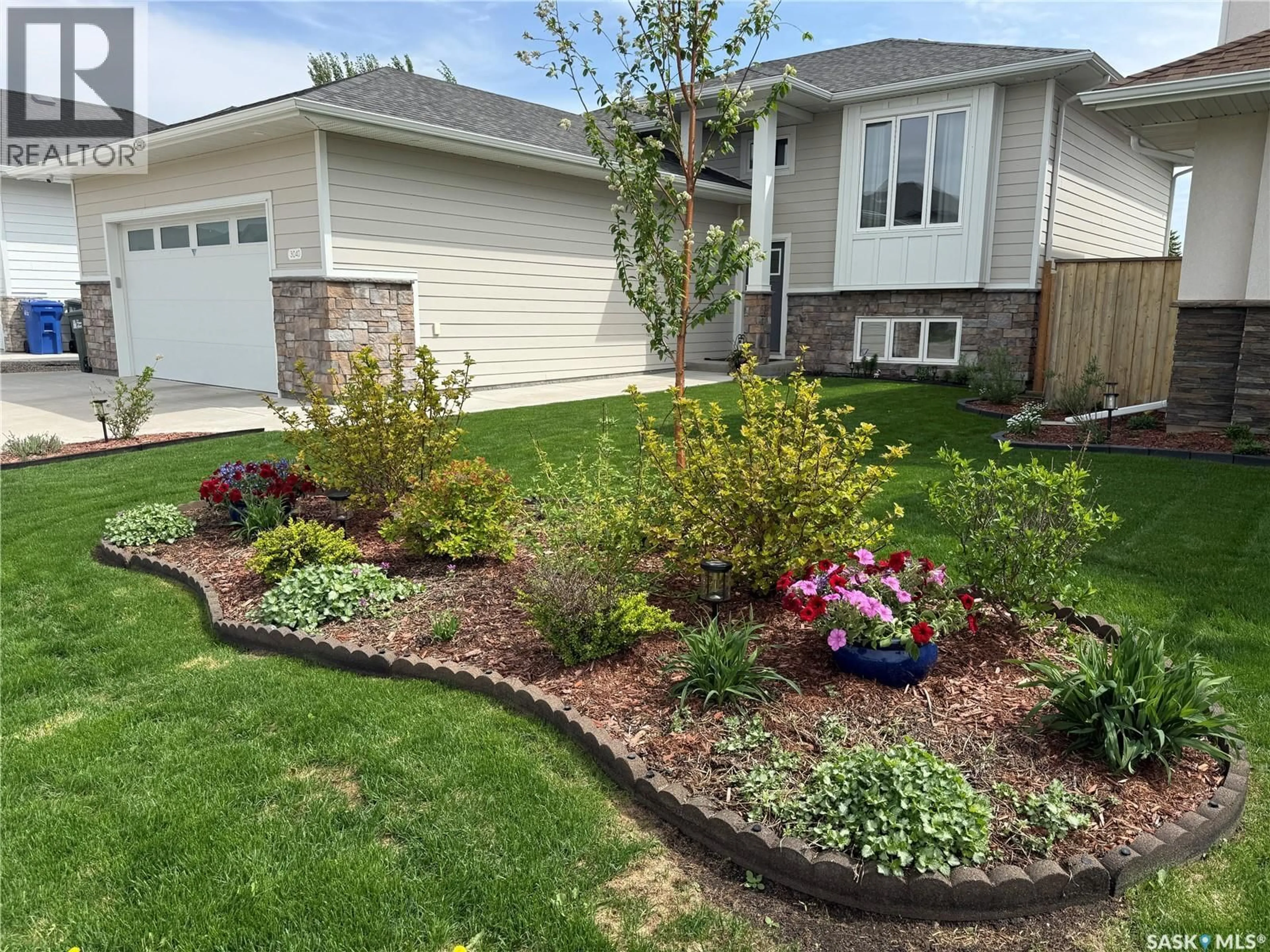Home with vinyl exterior material, street for 3040 LAKEVIEW DRIVE, Prince Albert Saskatchewan S6W0A4