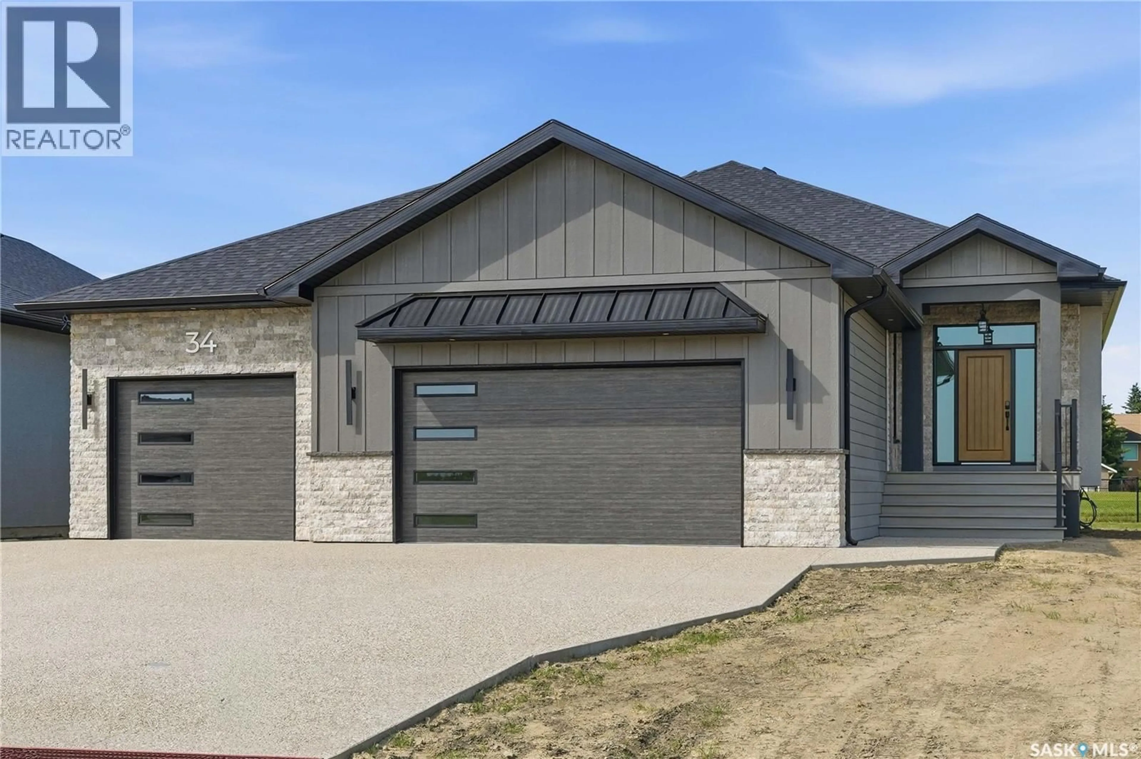 Home with brick exterior material, street for 34 HUBER DRIVE, Edenwold Rm No.158 Saskatchewan S4L0E7