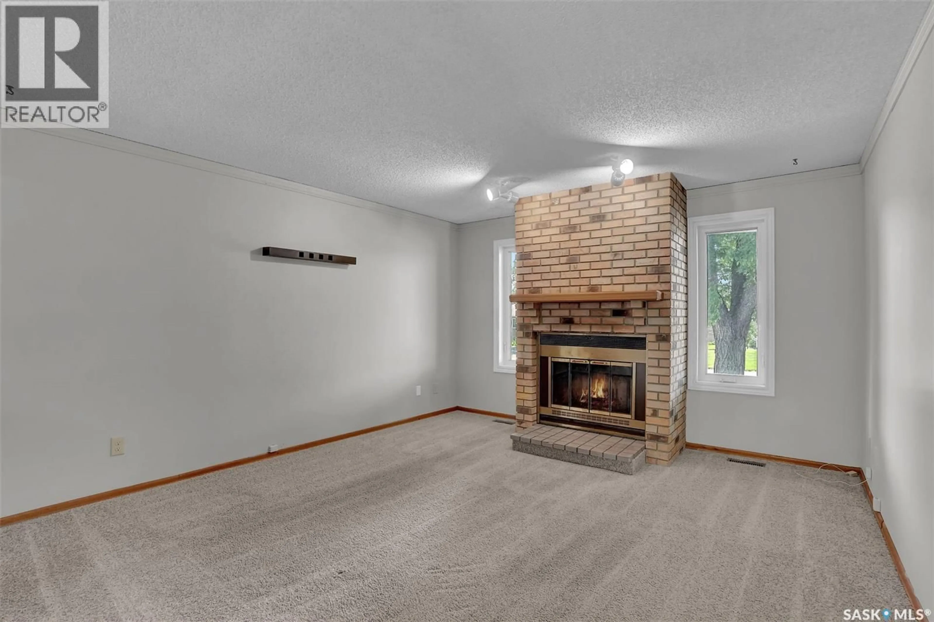 Living room with furniture, unknown for 1409 ROTHWELL STREET, Regina Saskatchewan S4N2B4
