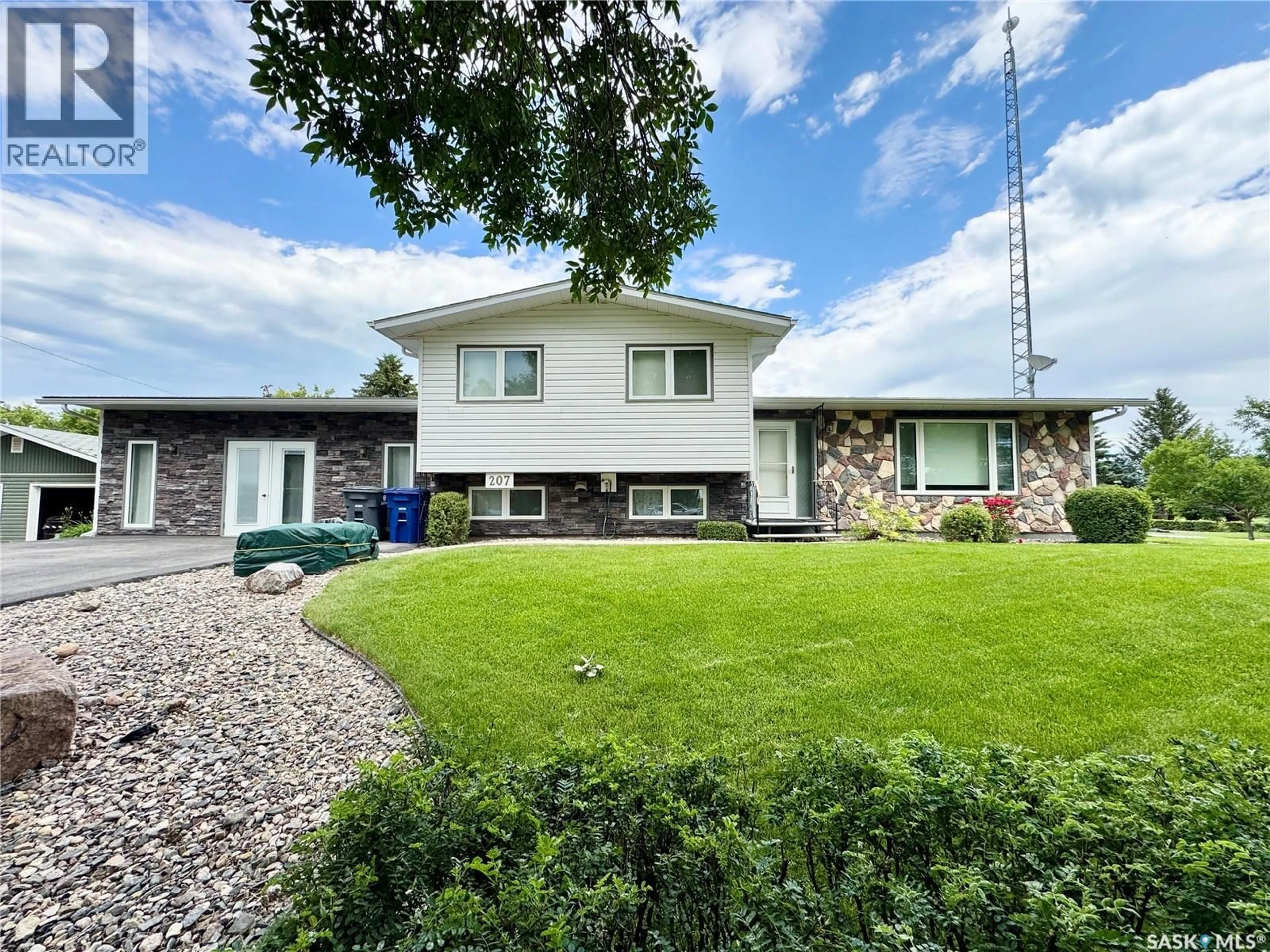 A pic from outside/outdoor area/front of a property/back of a property/a pic from drone, street for 207 3RD AVENUE, Scott Saskatchewan S0K4A0