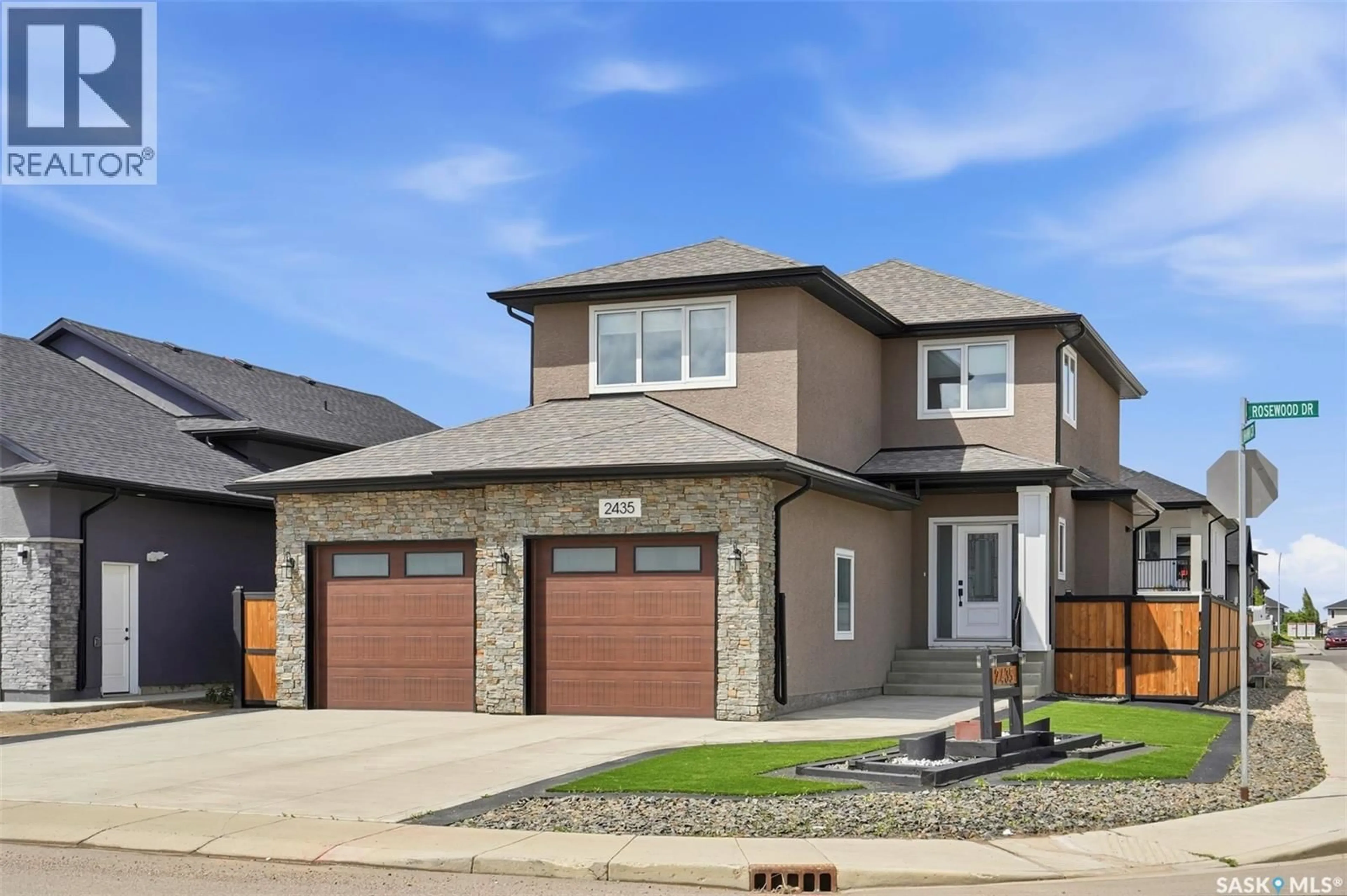 Home with brick exterior material, street for 2435 ROSEWOOD DRIVE, Saskatoon Saskatchewan S7V0Z3