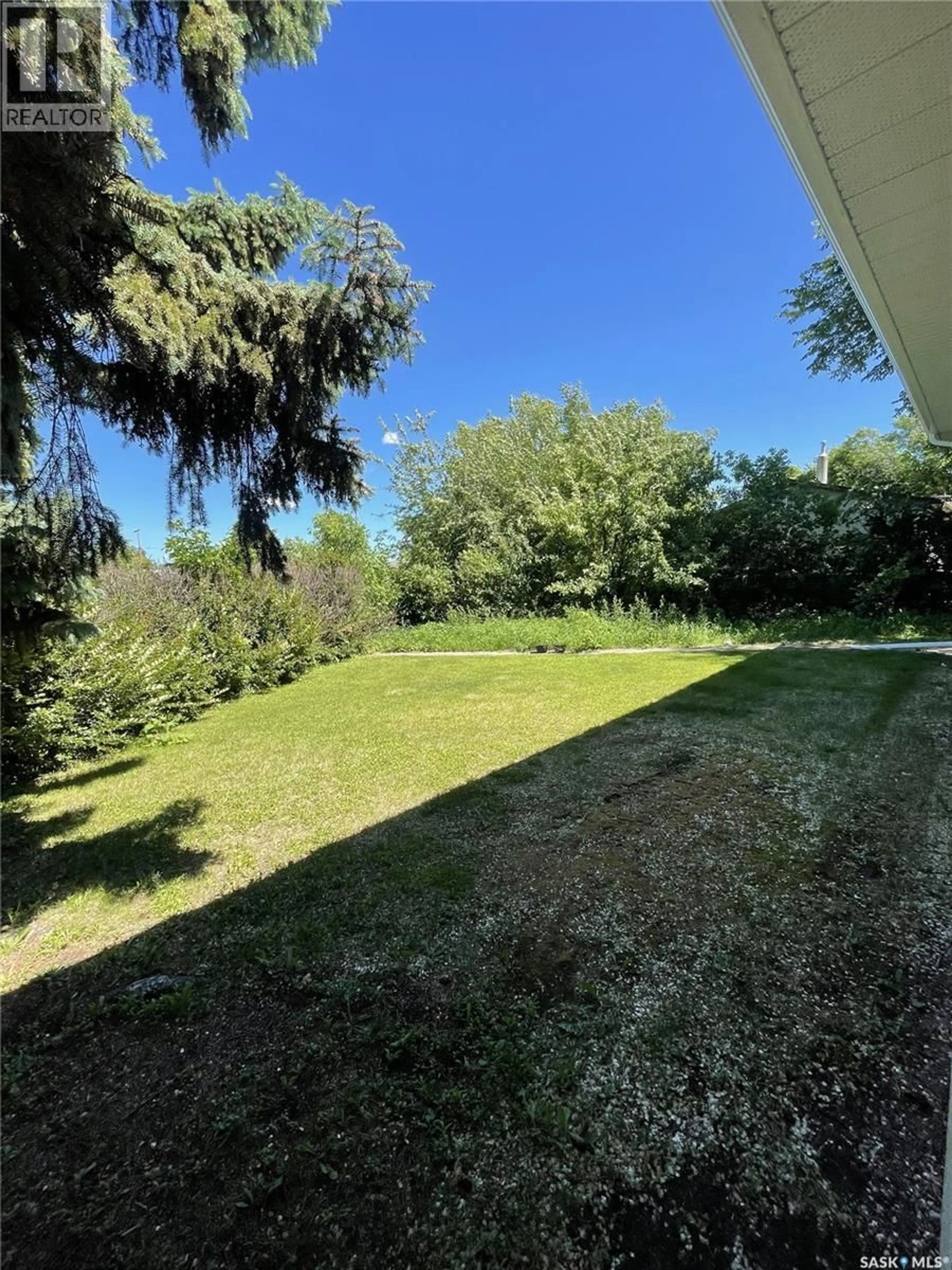 A pic from outside/outdoor area/front of a property/back of a property/a pic from drone, forest/trees view for 2800 1ST AVENUE, Prince Albert Saskatchewan S6V2C8