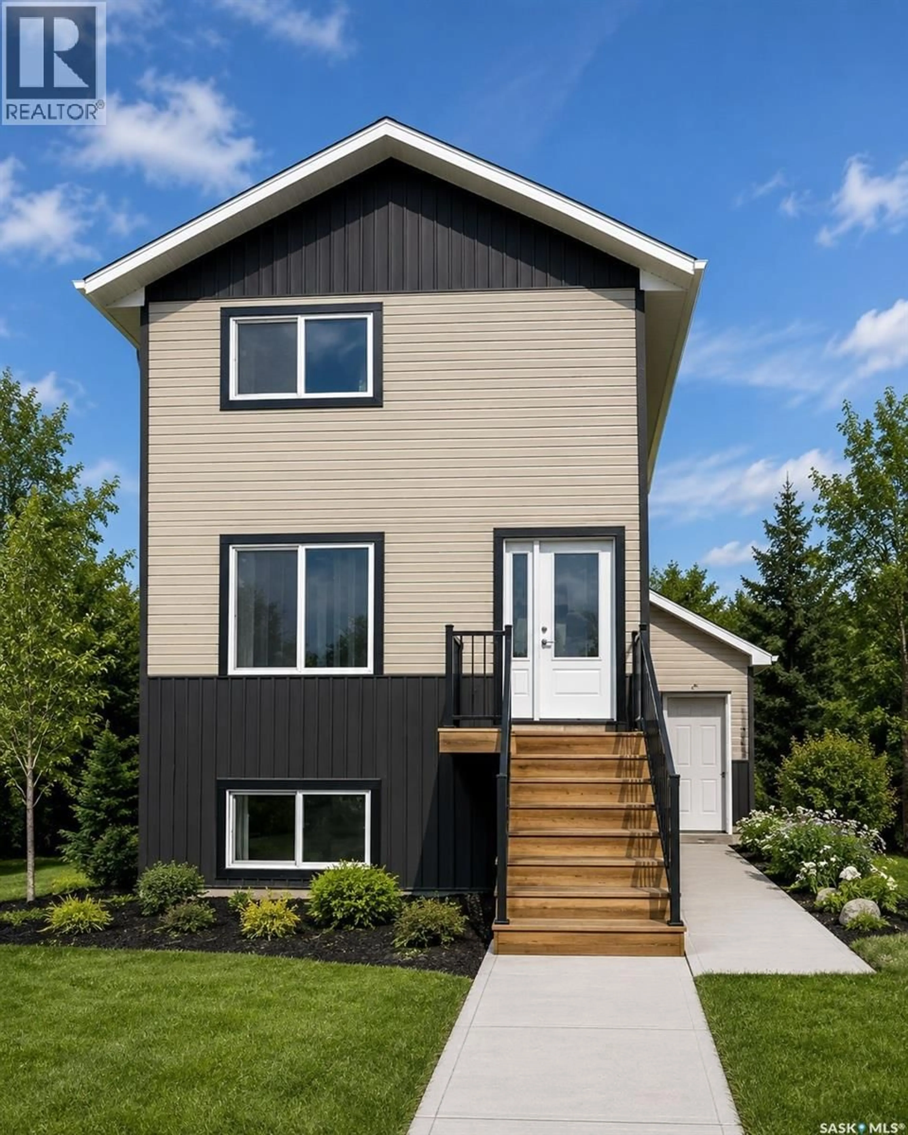 Home with vinyl exterior material, street for 13 CLEMENT ROAD, Lanigan Saskatchewan S0K2M0