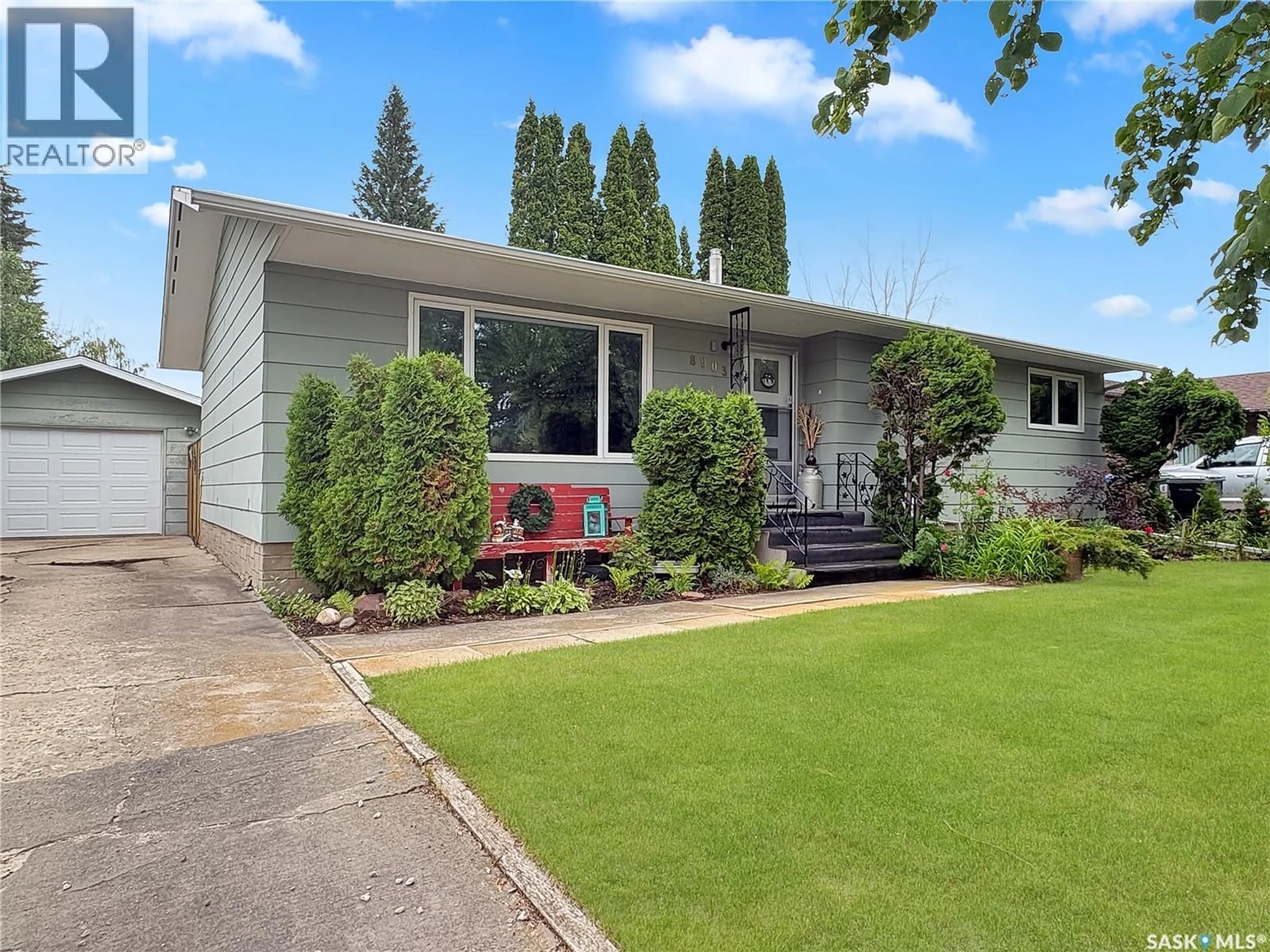 Home with vinyl exterior material, street for 8903 THOMAS AVENUE, North Battleford Saskatchewan S9A3H4