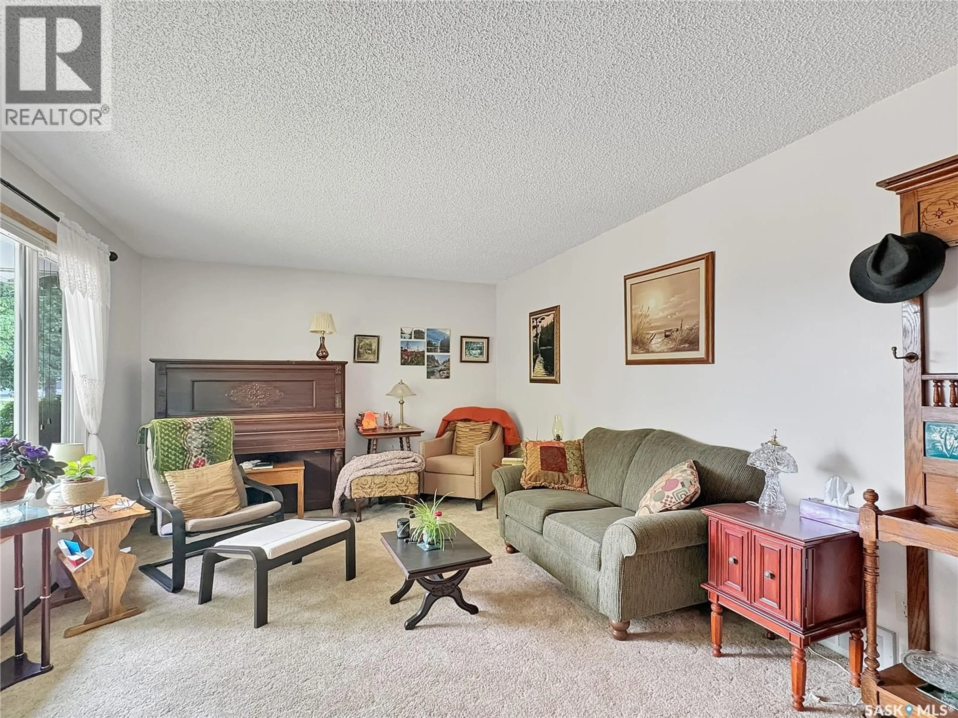 Living room with furniture, unknown for 8903 THOMAS AVENUE, North Battleford Saskatchewan S9A3H4