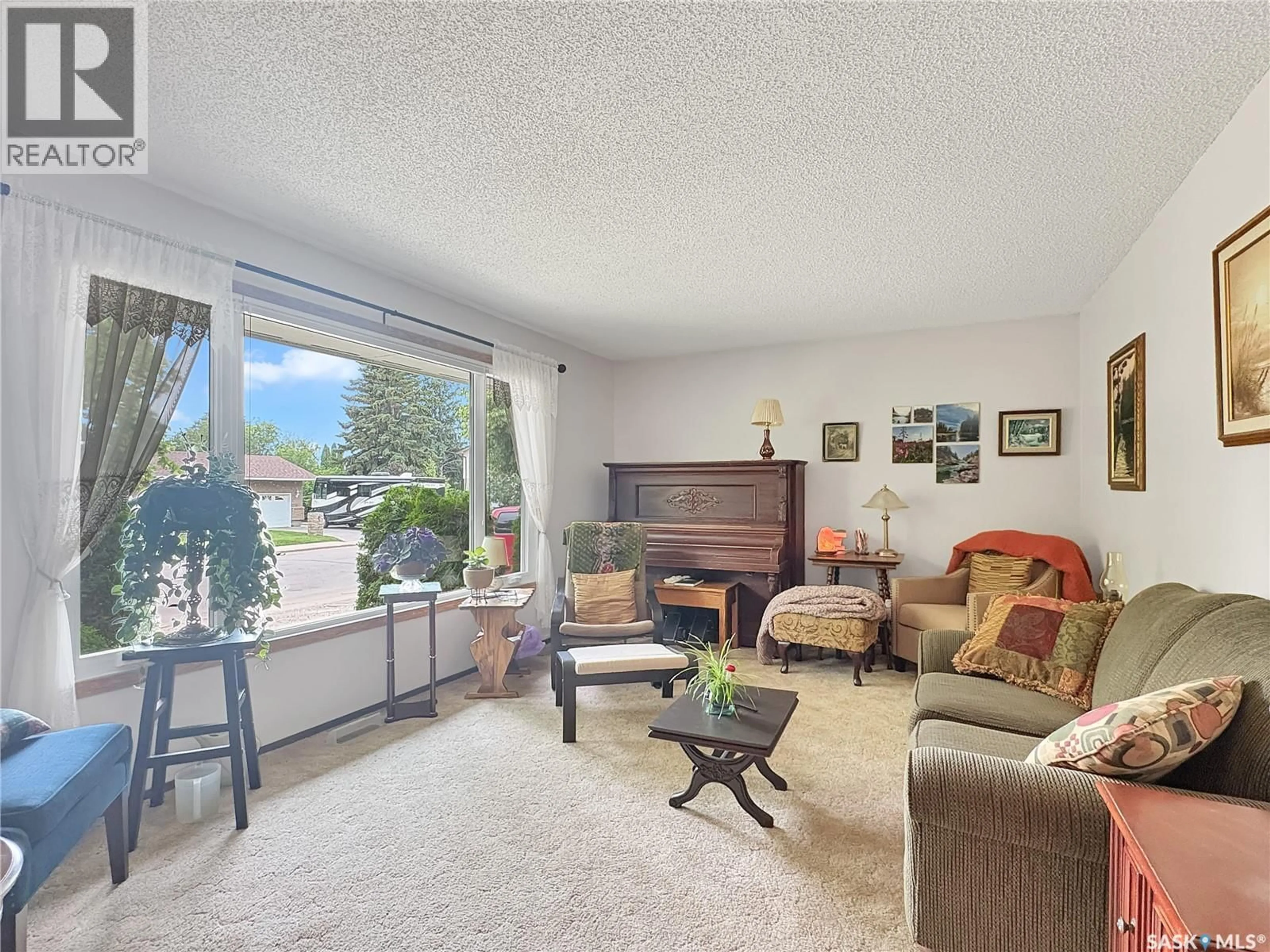 Living room with furniture, unknown for 8903 THOMAS AVENUE, North Battleford Saskatchewan S9A3H4