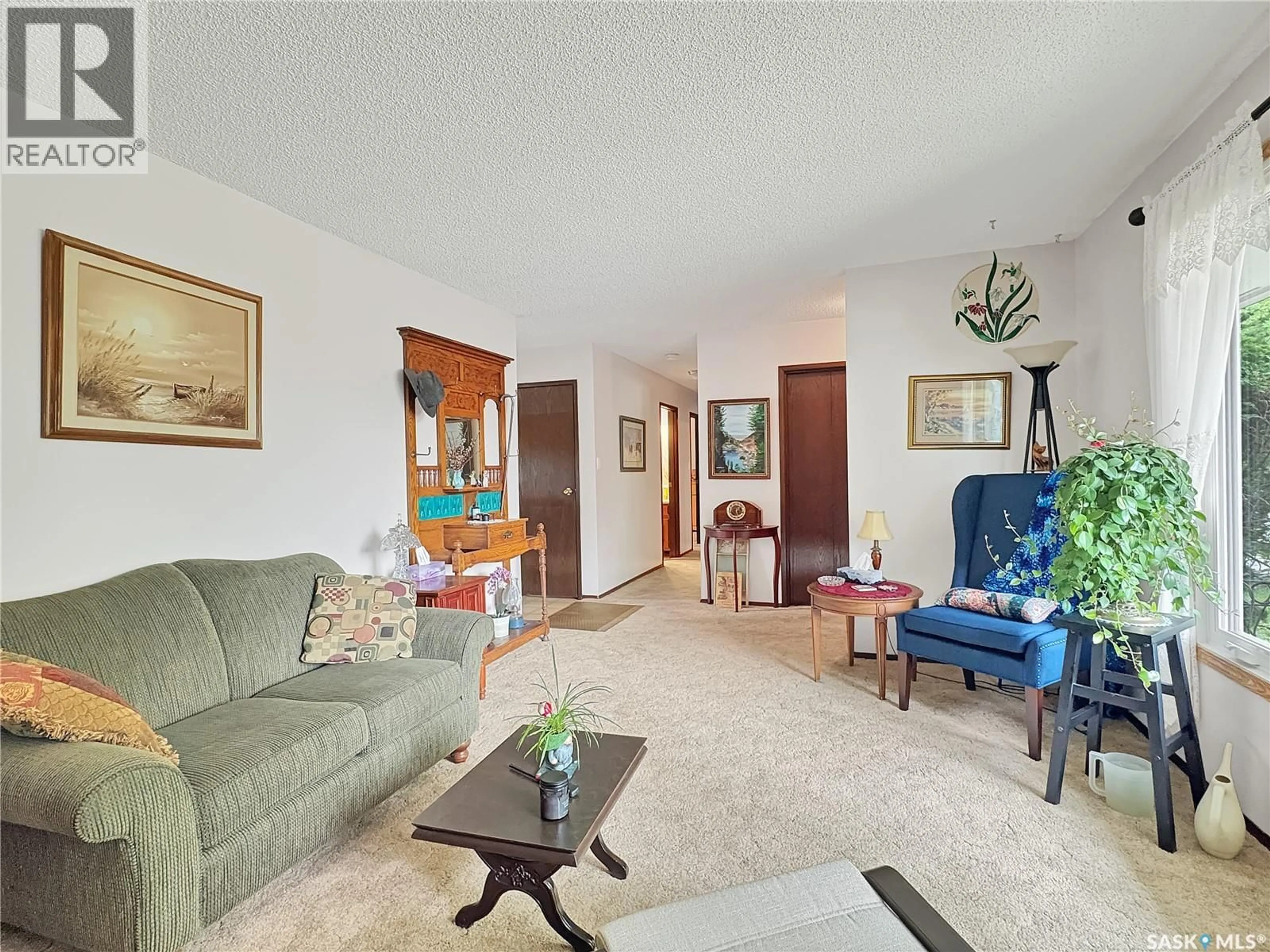 Living room with furniture, unknown for 8903 THOMAS AVENUE, North Battleford Saskatchewan S9A3H4