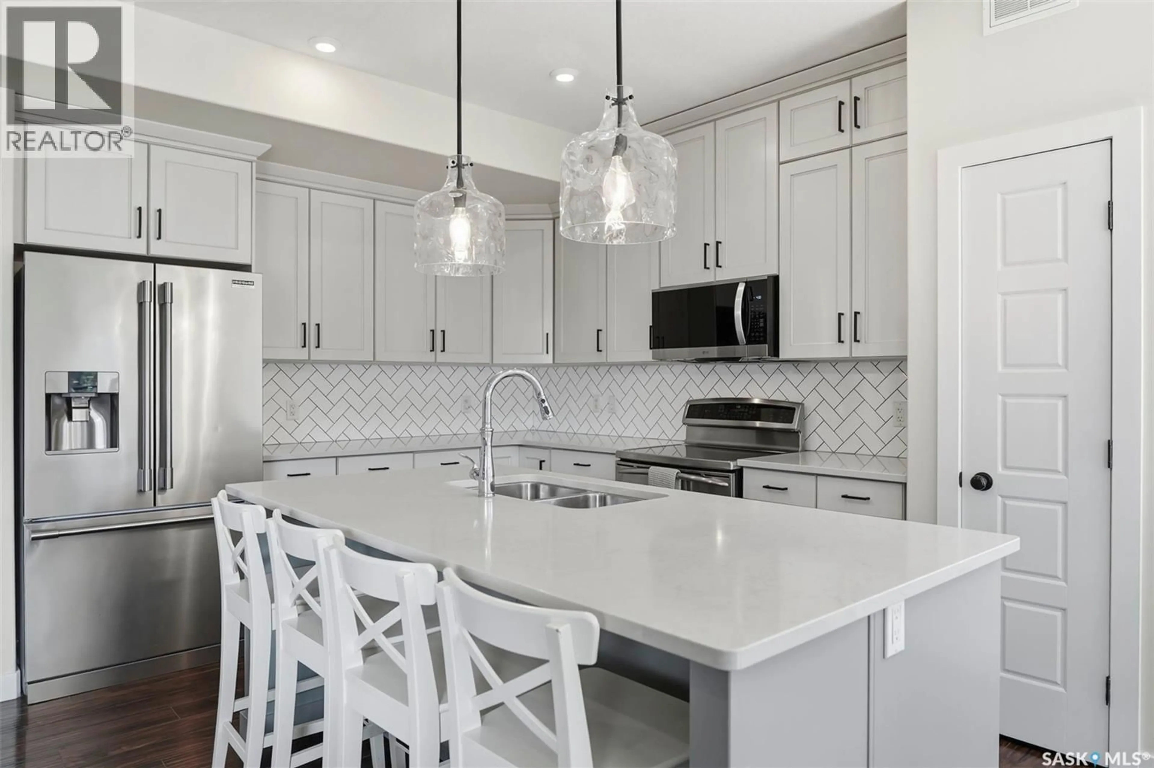 Open concept kitchen, ceramic/tile floor for 1339 PRINGLE MANOR, Saskatoon Saskatchewan S7T0S6