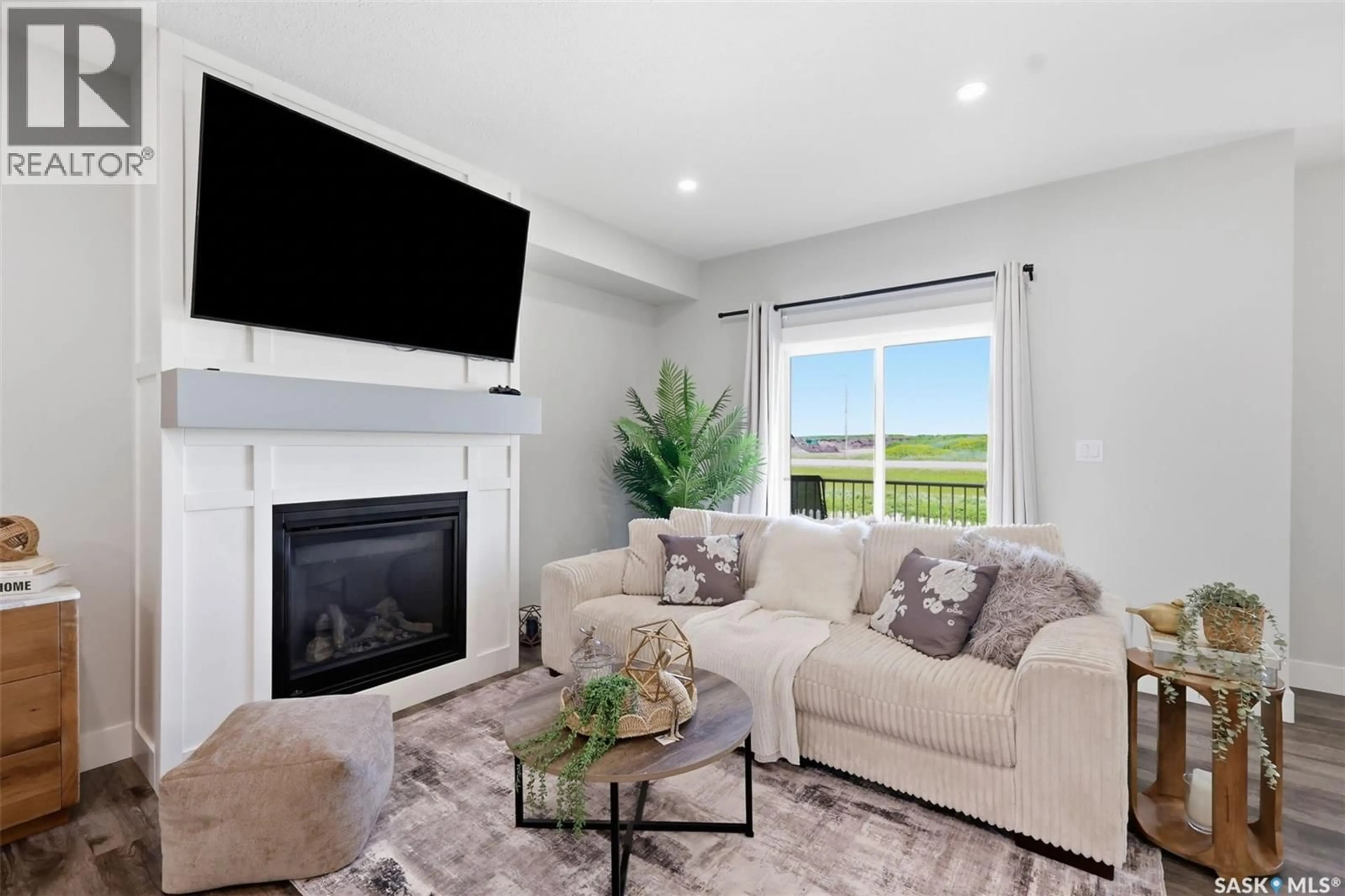 Living room with furniture, unknown for 900 - 67 ST ANDREWS LANE, Warman Saskatchewan S0K4S4