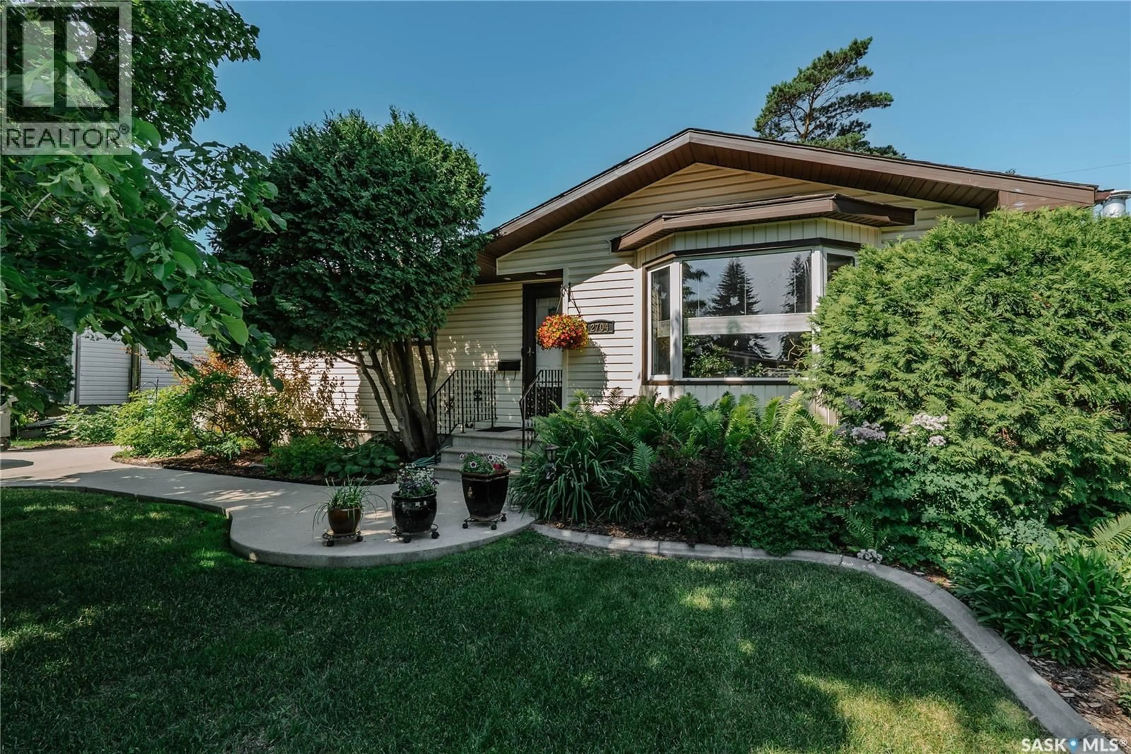 Home with brick exterior material, street for 2704 PRESTON AVENUE, Saskatoon Saskatchewan S7J2G6