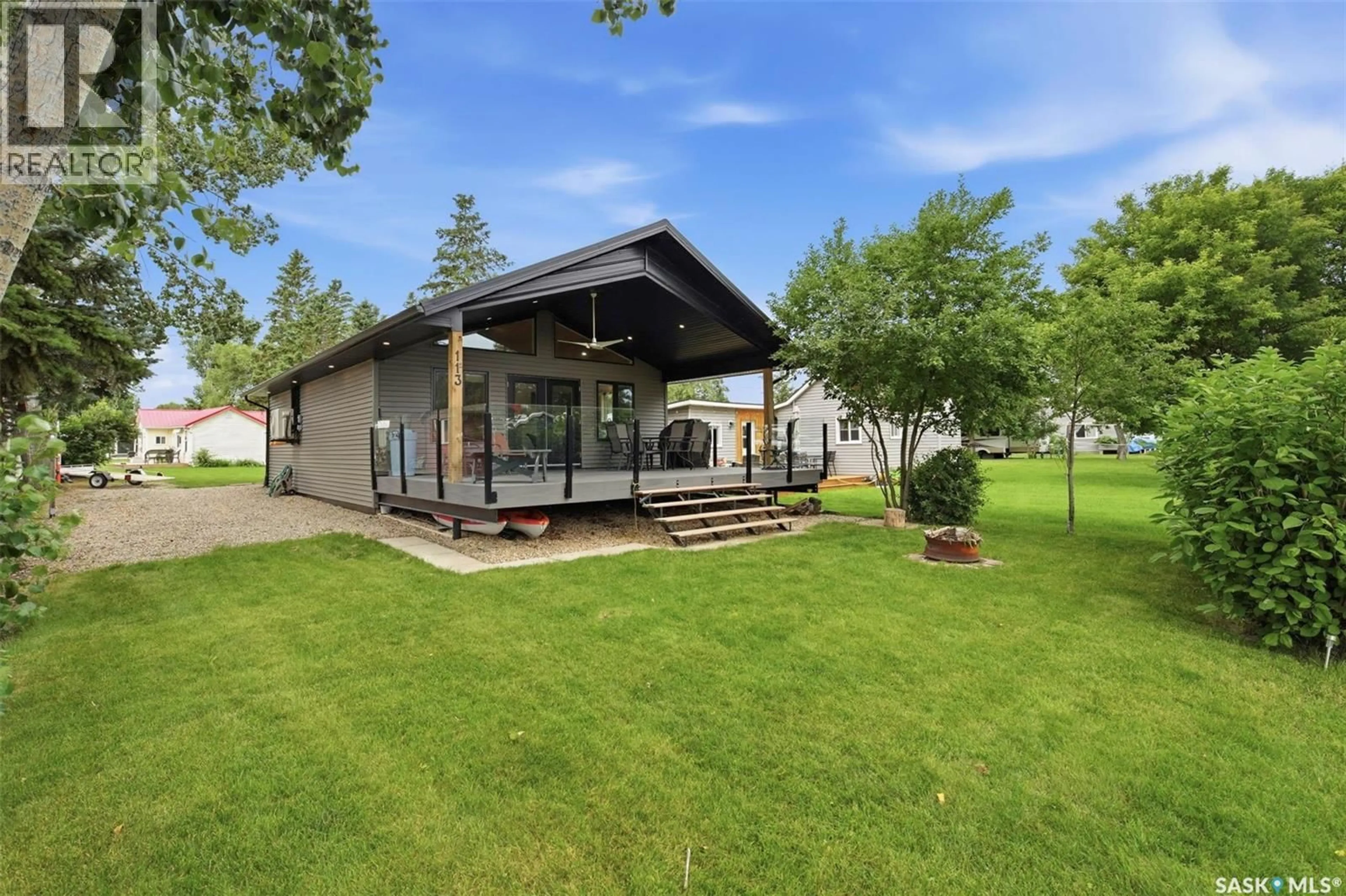 A pic from outside/outdoor area/front of a property/back of a property/a pic from drone, unknown for 113 4TH STREET, Etters Beach Saskatchewan S0G2J0