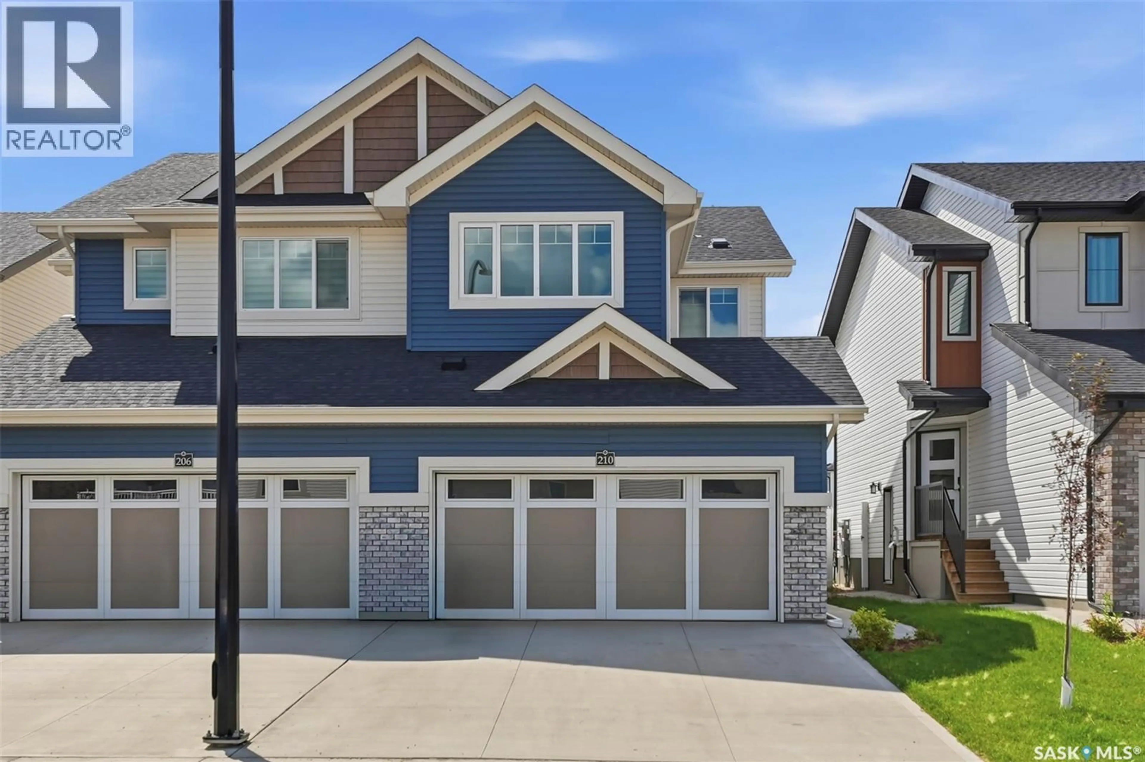 Home with vinyl exterior material, street for 210 SCHMEISER BEND, Saskatoon Saskatchewan S7V1P7