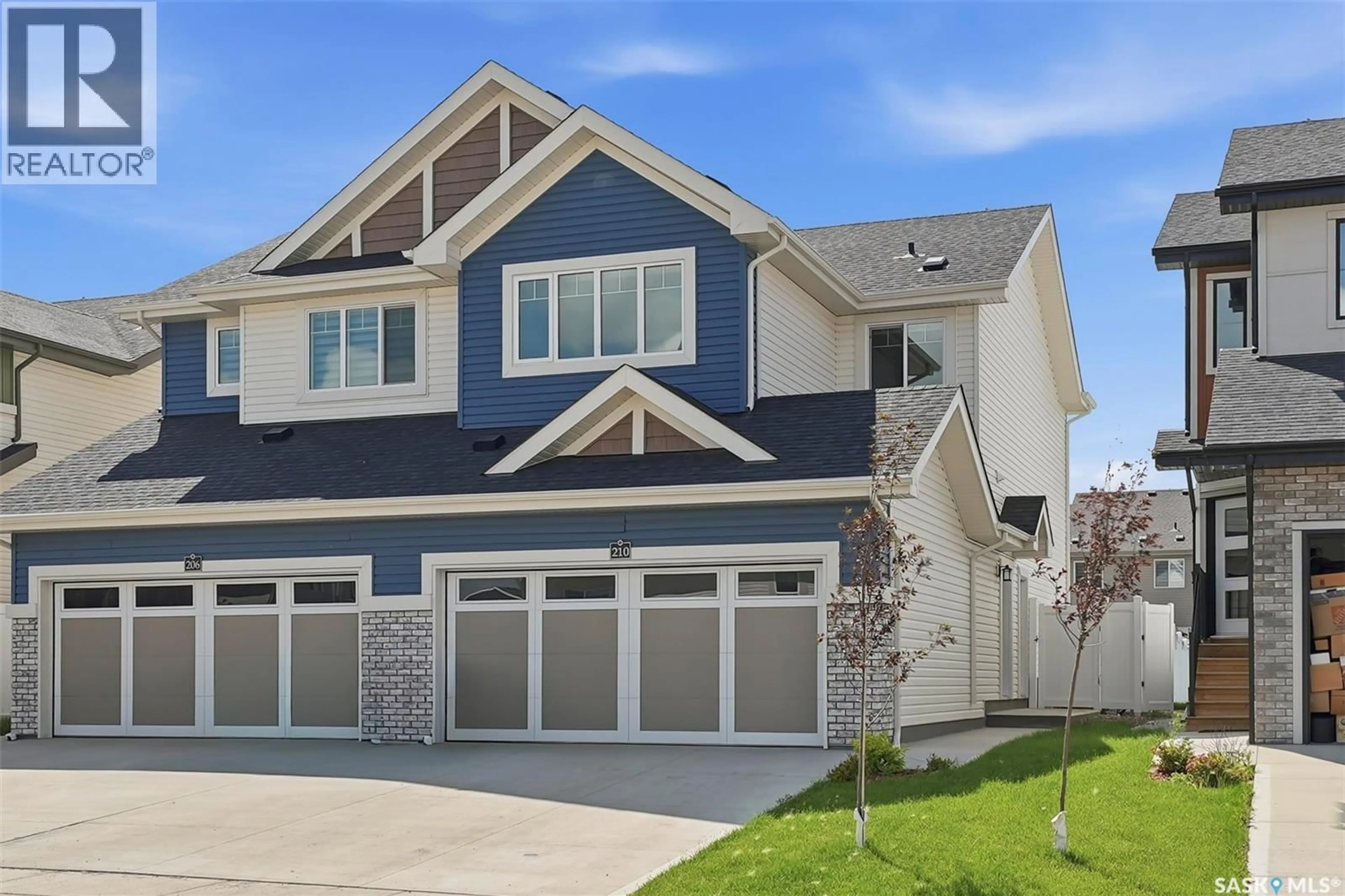 Home with vinyl exterior material, street for 210 SCHMEISER BEND, Saskatoon Saskatchewan S7V1P7