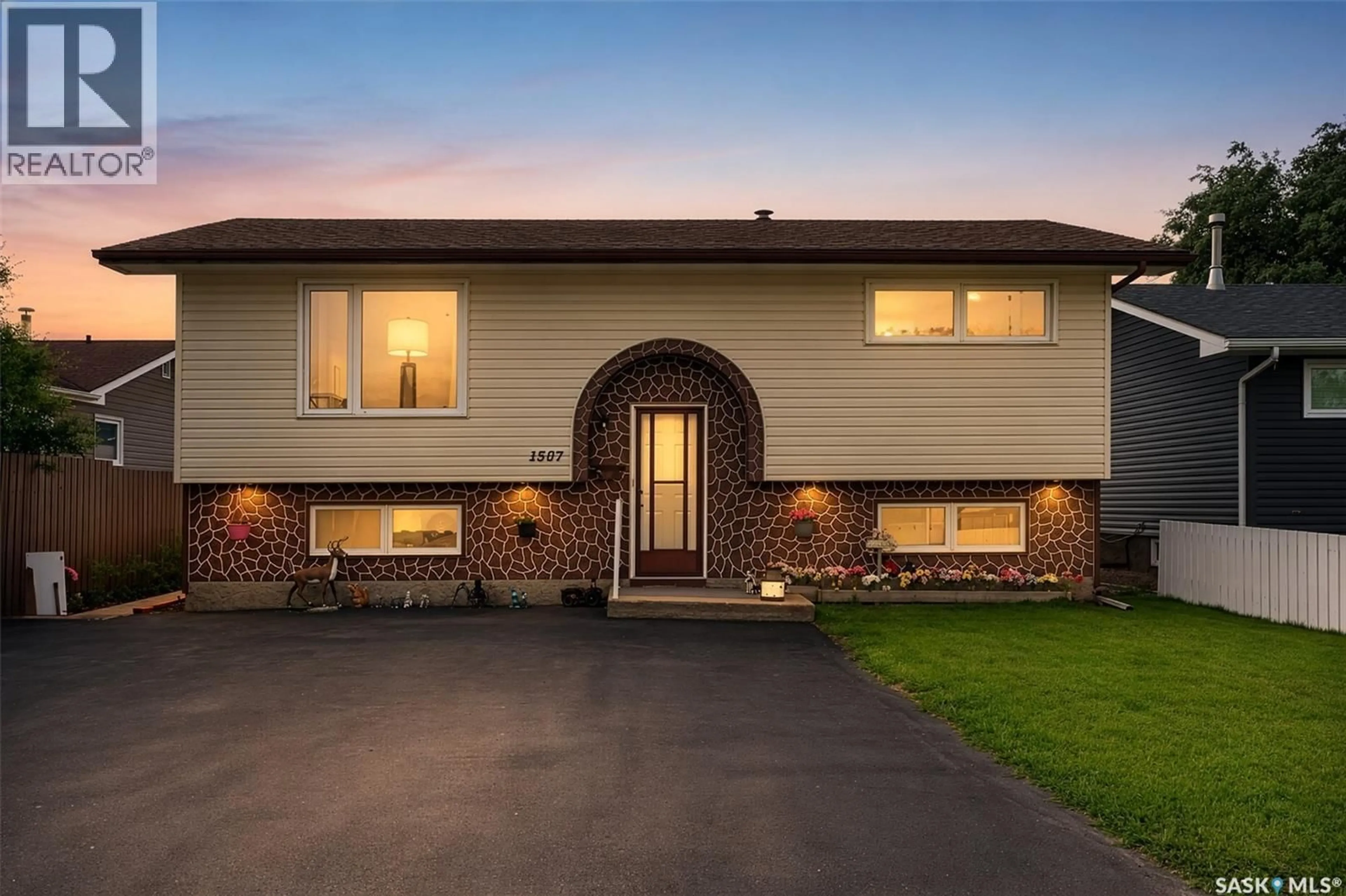 Home with brick exterior material, street for 1507 CARIBOU STREET W, Moose Jaw Saskatchewan S6H7N5