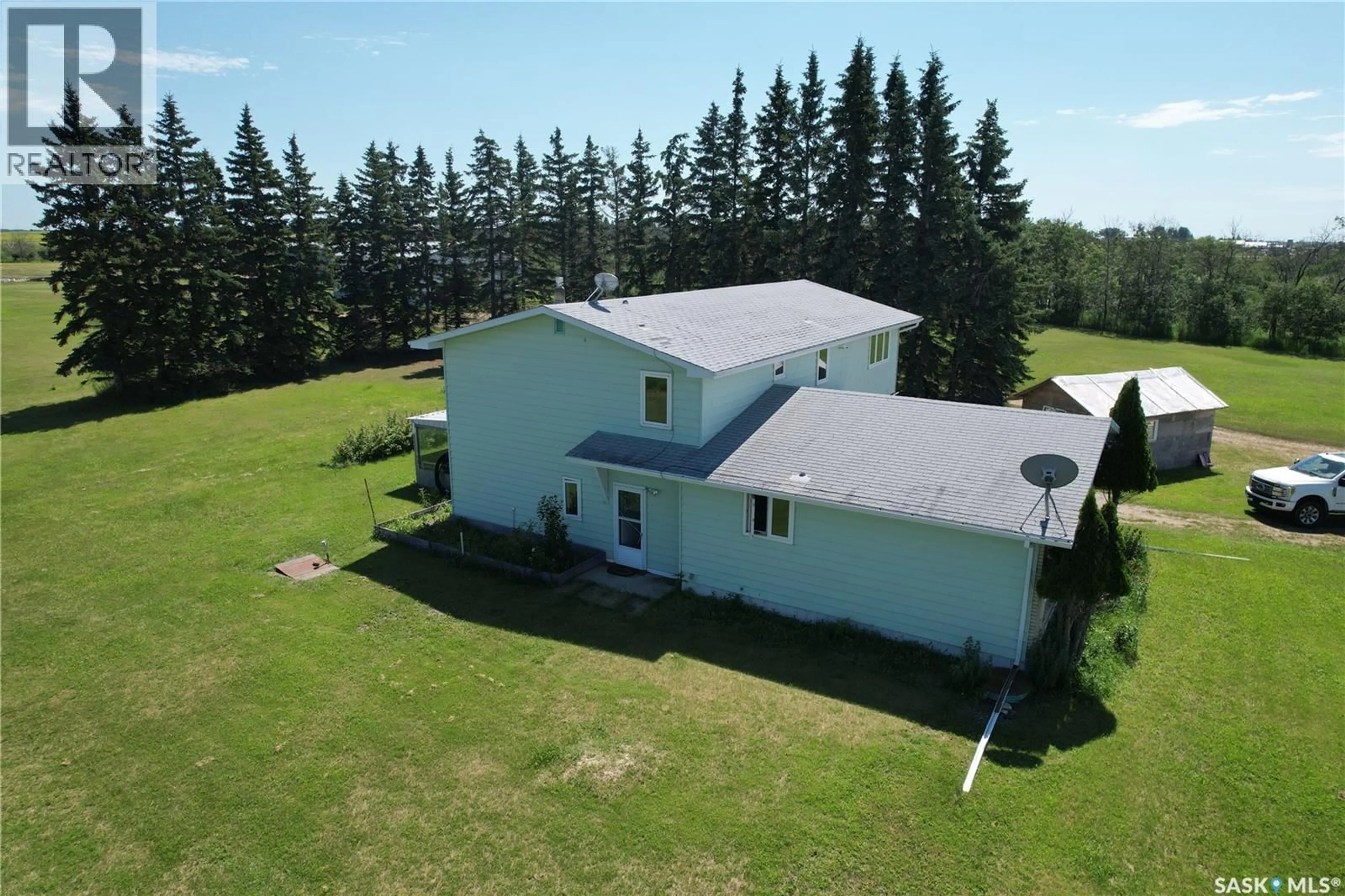 A pic from outside/outdoor area/front of a property/back of a property/a pic from drone, building for 6 RAYMORE ACREAGE HWY, Mount Hope Rm No. 279 Saskatchewan S0A3S0