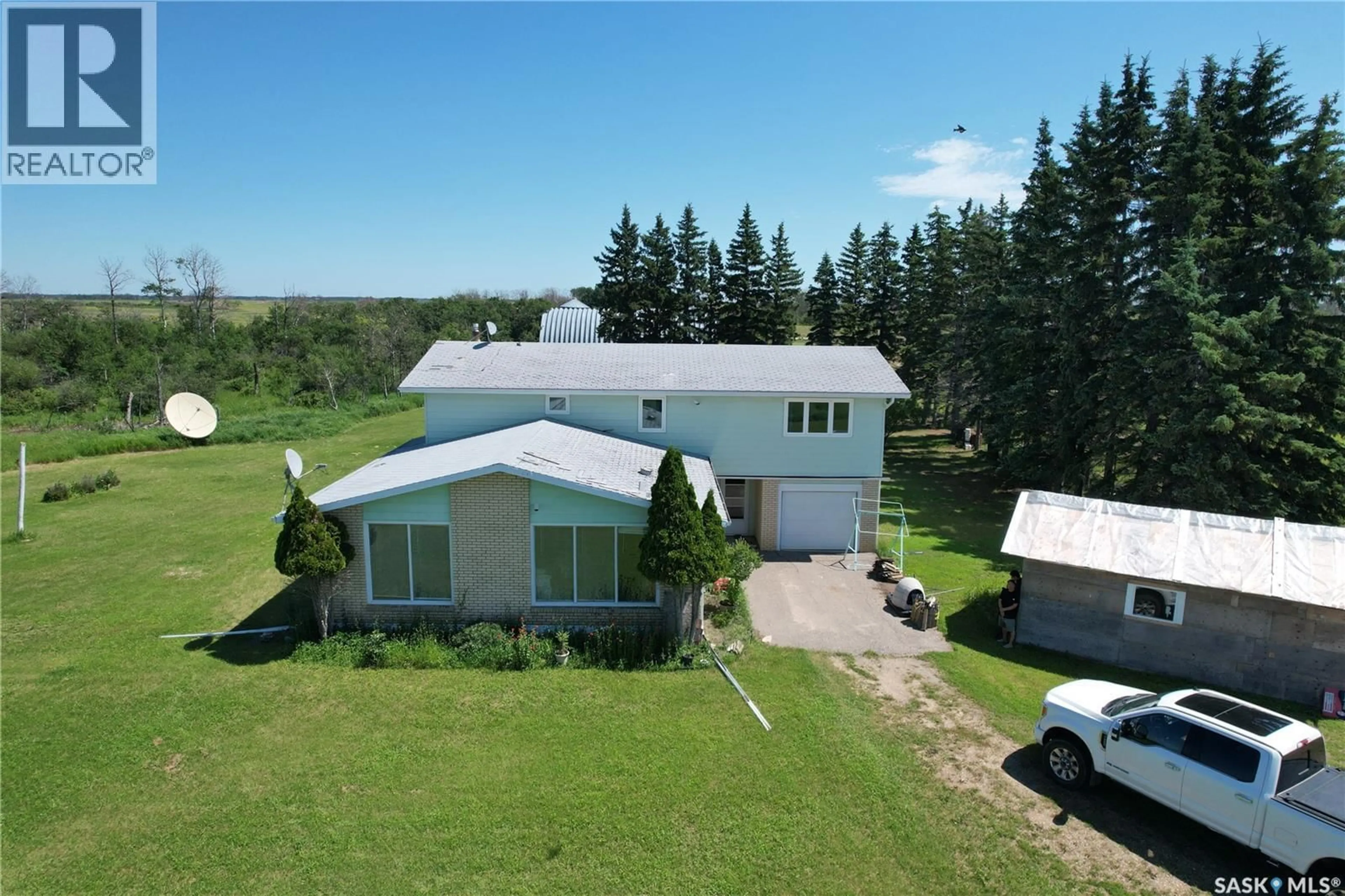 A pic from outside/outdoor area/front of a property/back of a property/a pic from drone, building for 6 RAYMORE ACREAGE HWY, Mount Hope Rm No. 279 Saskatchewan S0A3S0