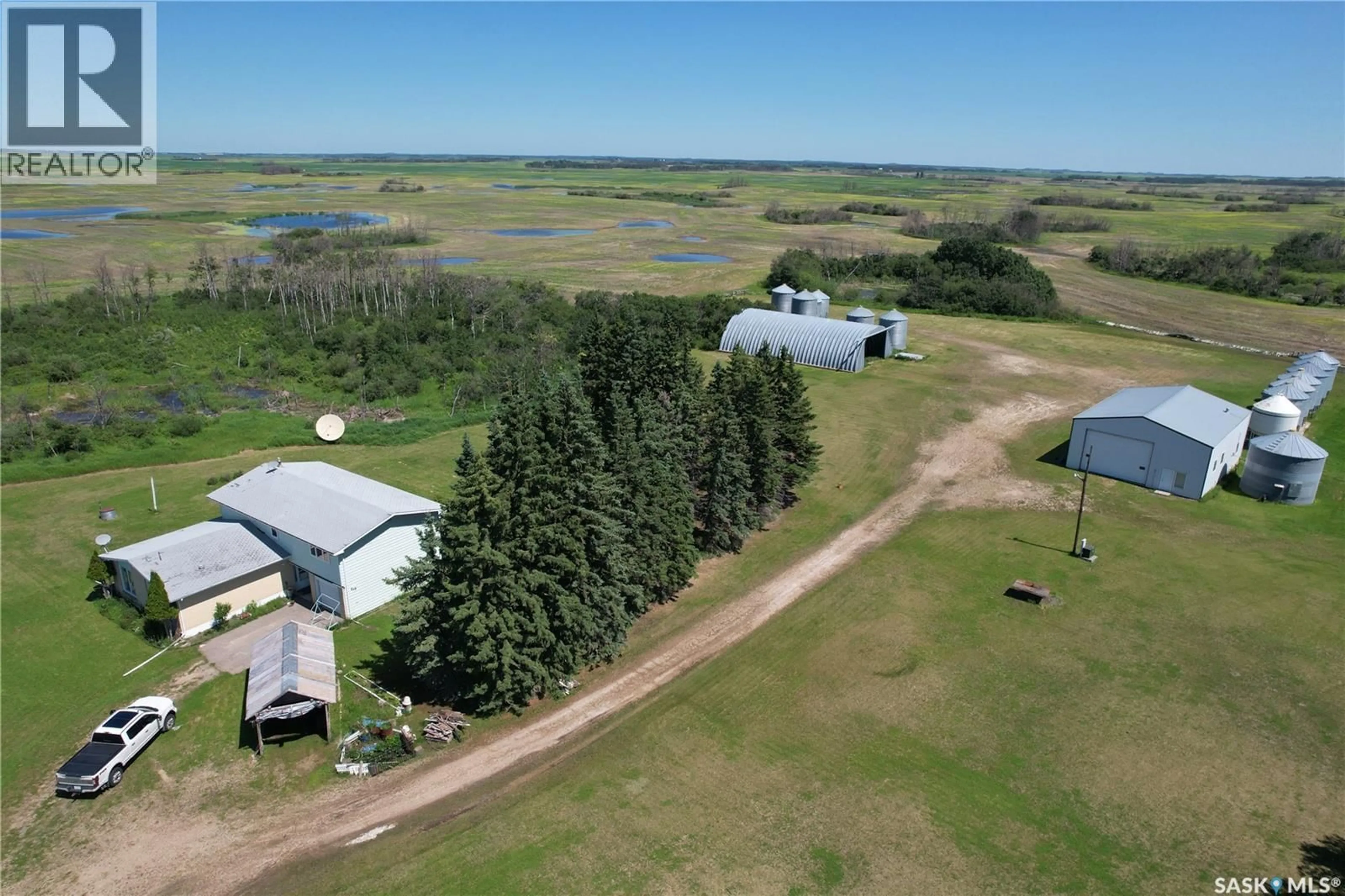 A pic from outside/outdoor area/front of a property/back of a property/a pic from drone, unknown for 6 RAYMORE ACREAGE HWY, Mount Hope Rm No. 279 Saskatchewan S0A3S0