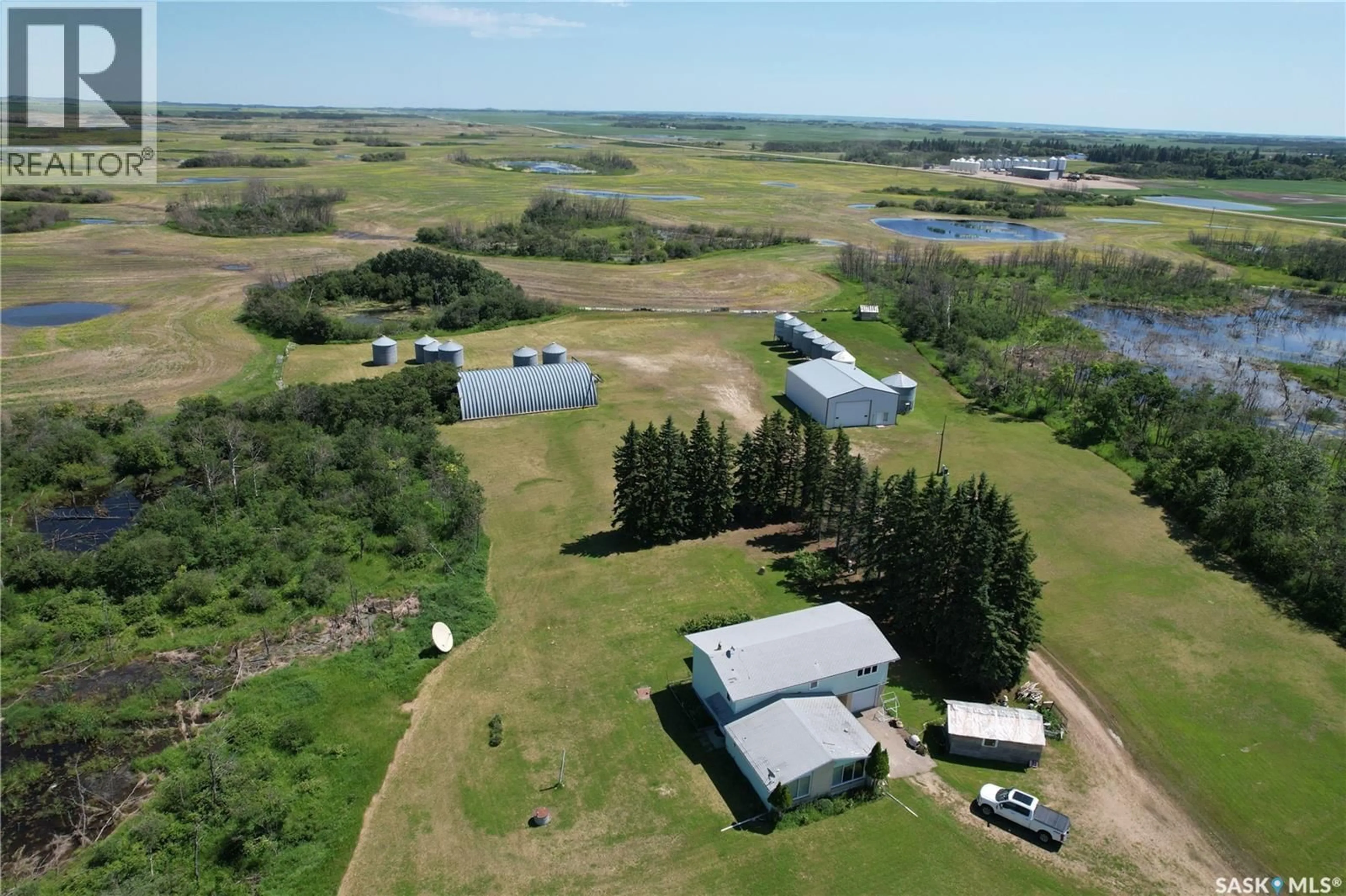 A pic from outside/outdoor area/front of a property/back of a property/a pic from drone, water/lake/river/ocean view for 6 RAYMORE ACREAGE HWY, Mount Hope Rm No. 279 Saskatchewan S0A3S0