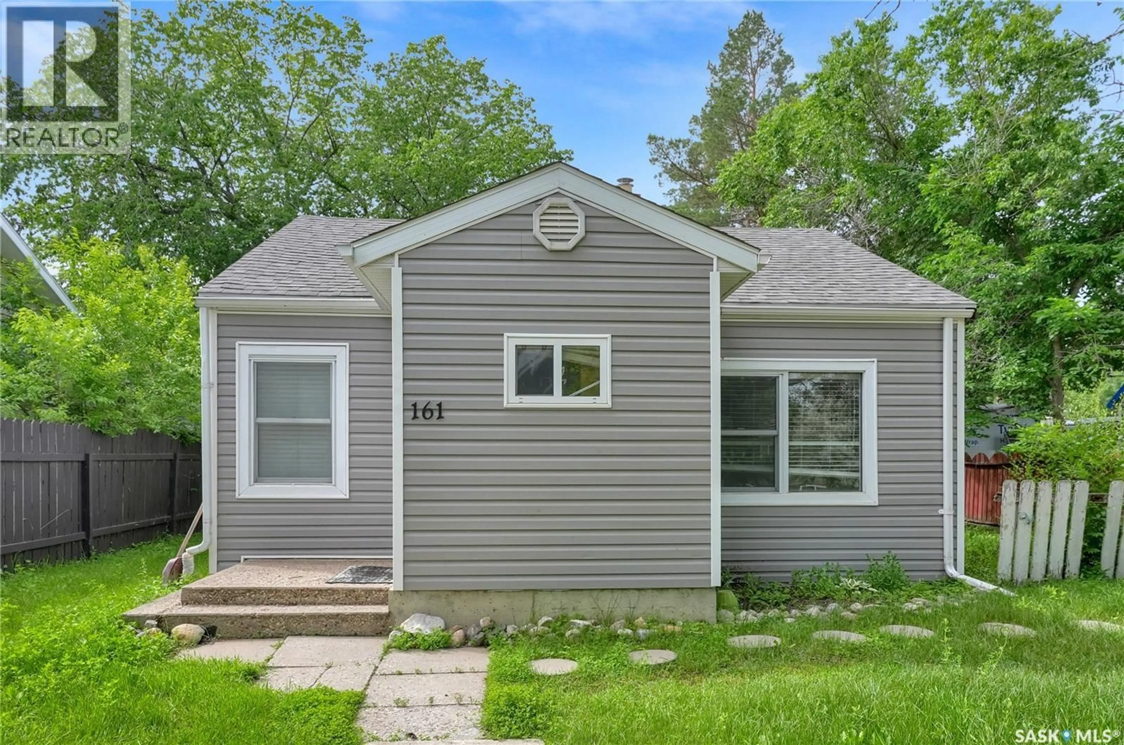 Home with vinyl exterior material, street for 161 LILLOOET STREET, Moose Jaw Saskatchewan S6H4S6