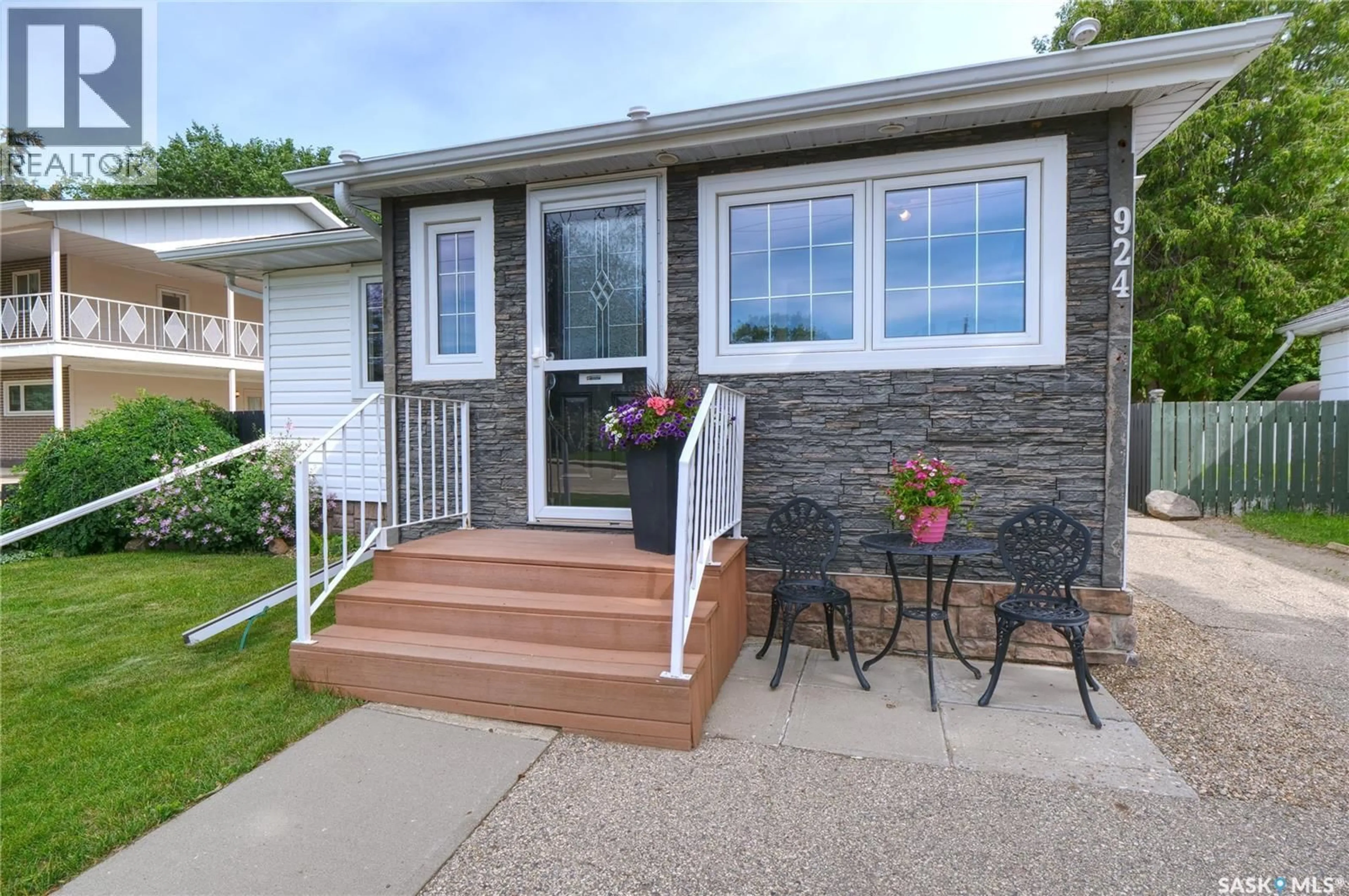 Home with vinyl exterior material, street for 924 HALL STREET, Moose Jaw Saskatchewan S6H2S4