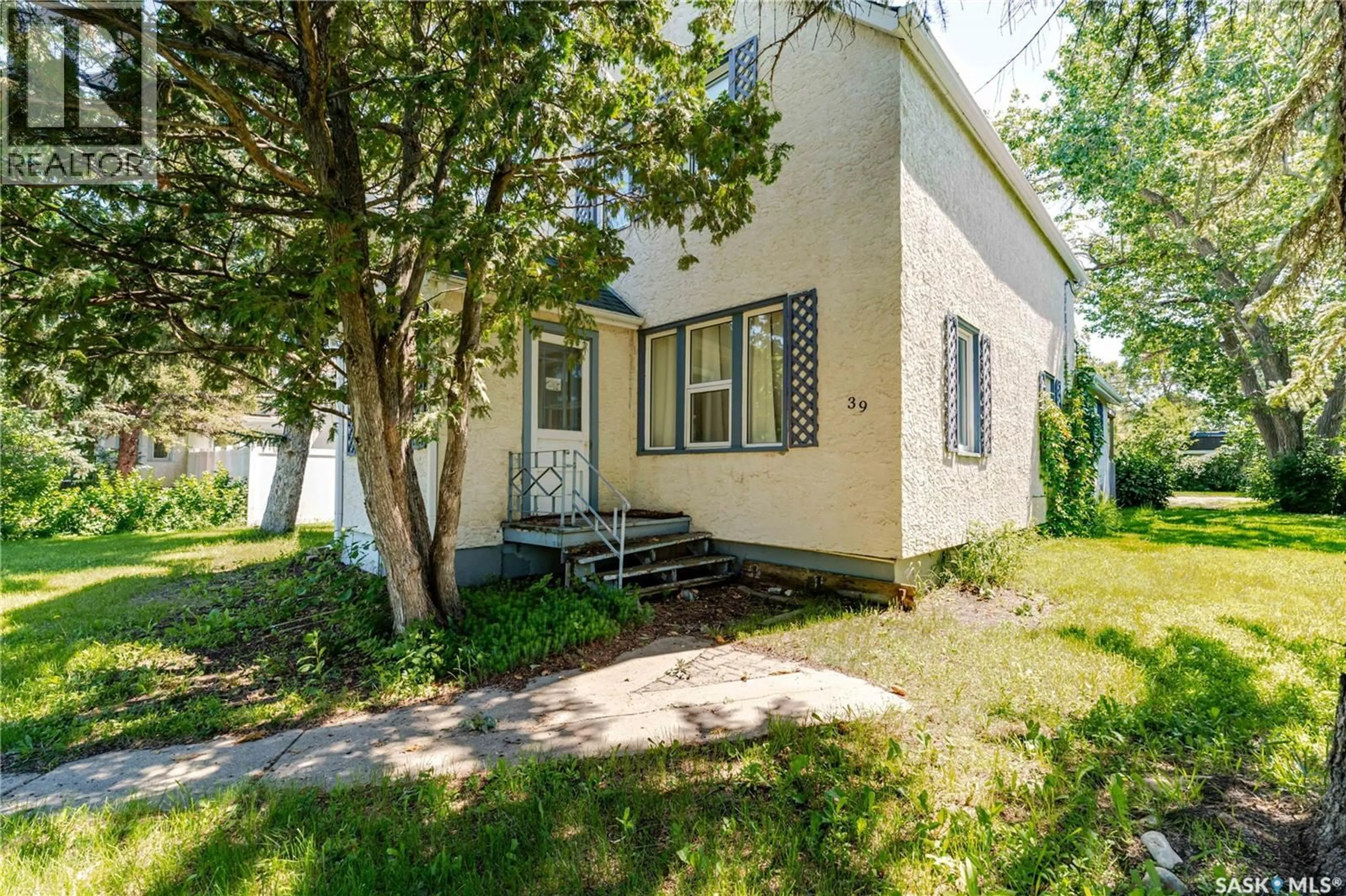 Home with vinyl exterior material, street for 39 COTEAU STREET, Wilcox Saskatchewan S0G5E0