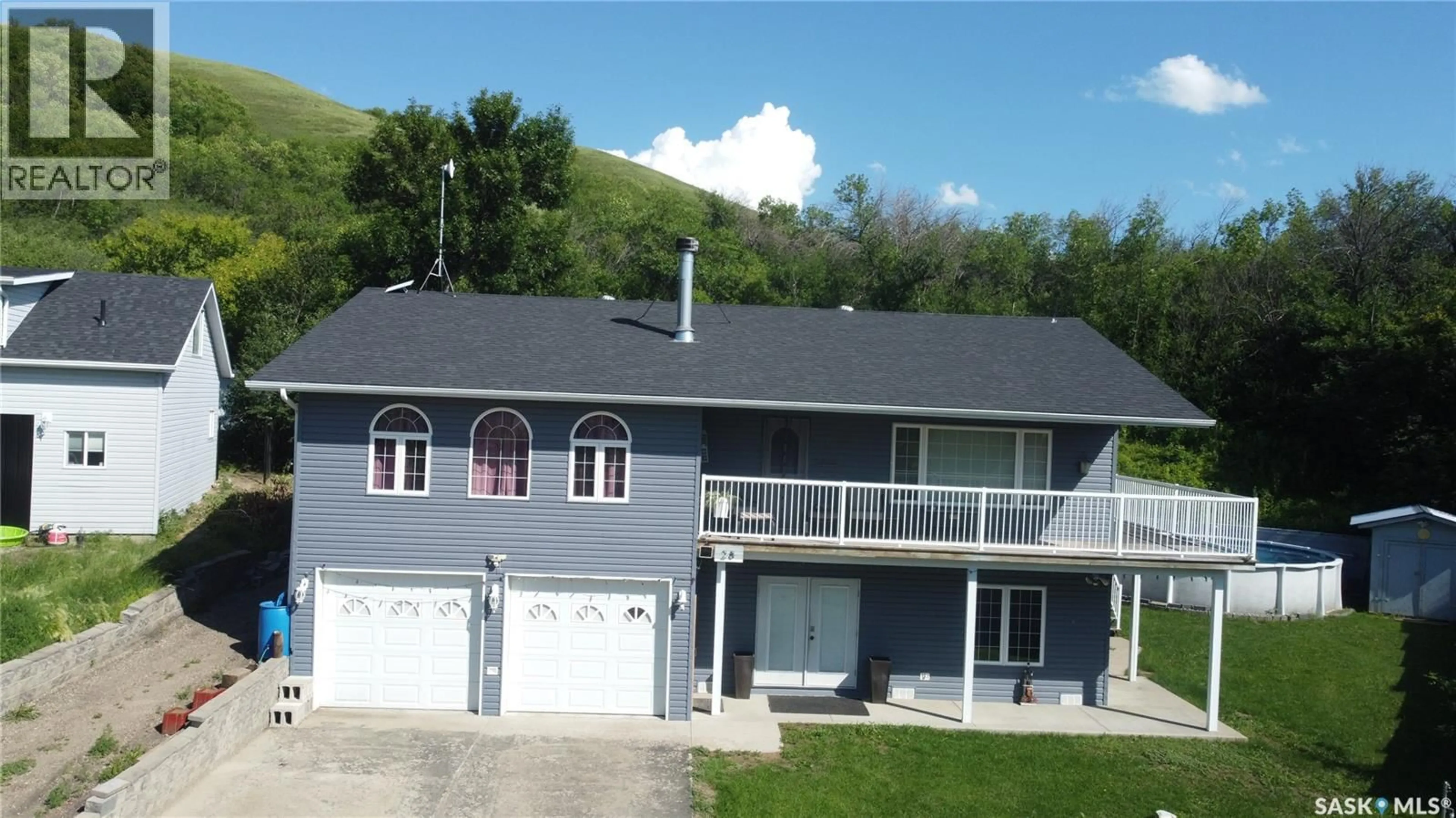 Home with vinyl exterior material, mountain view for 28 ALICE CRESCENT, North Grove Saskatchewan S0H4C0