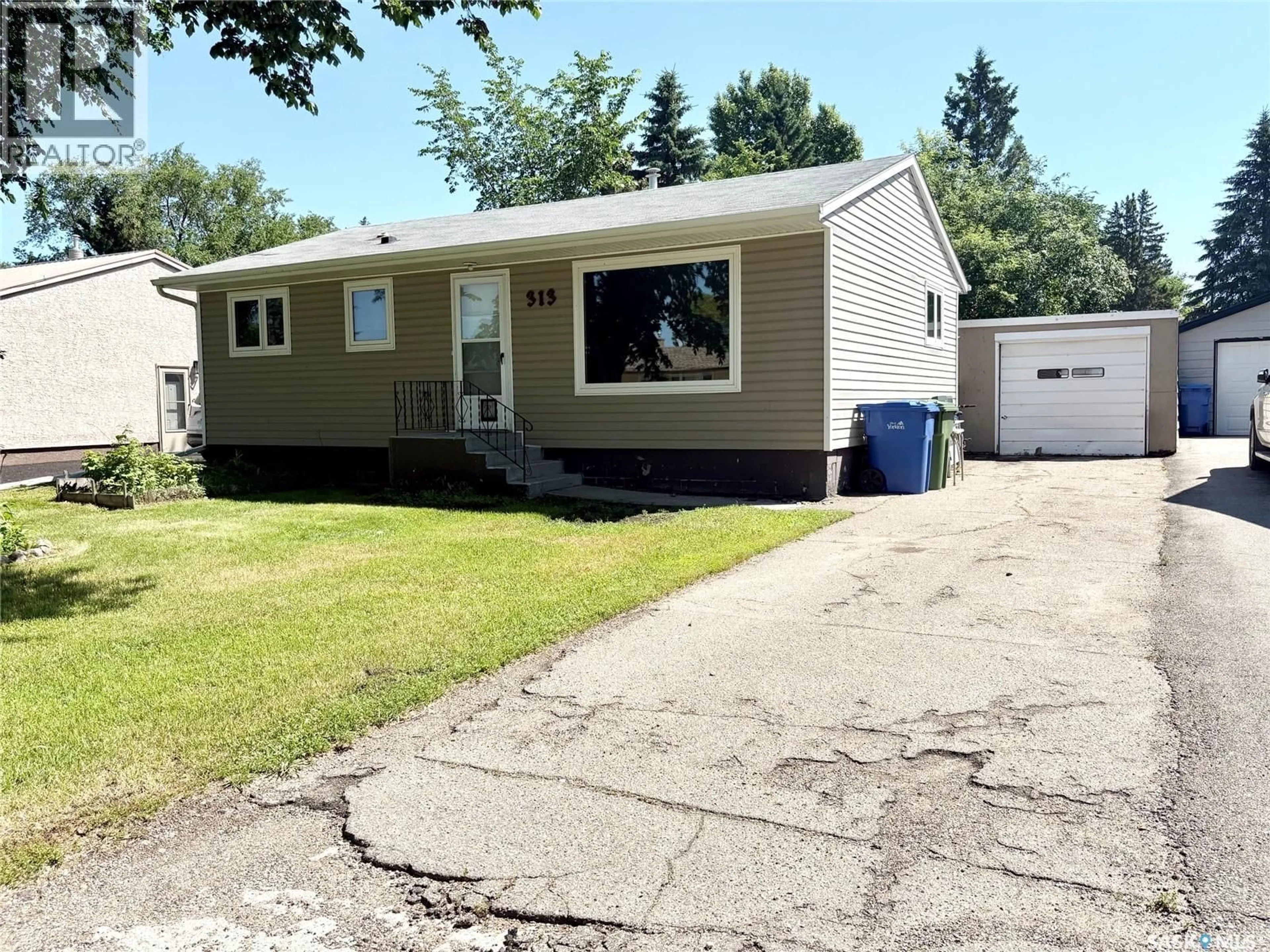 Home with vinyl exterior material, street for N - 313 MYRTLE AVENUE, Yorkton Saskatchewan S3N1R7