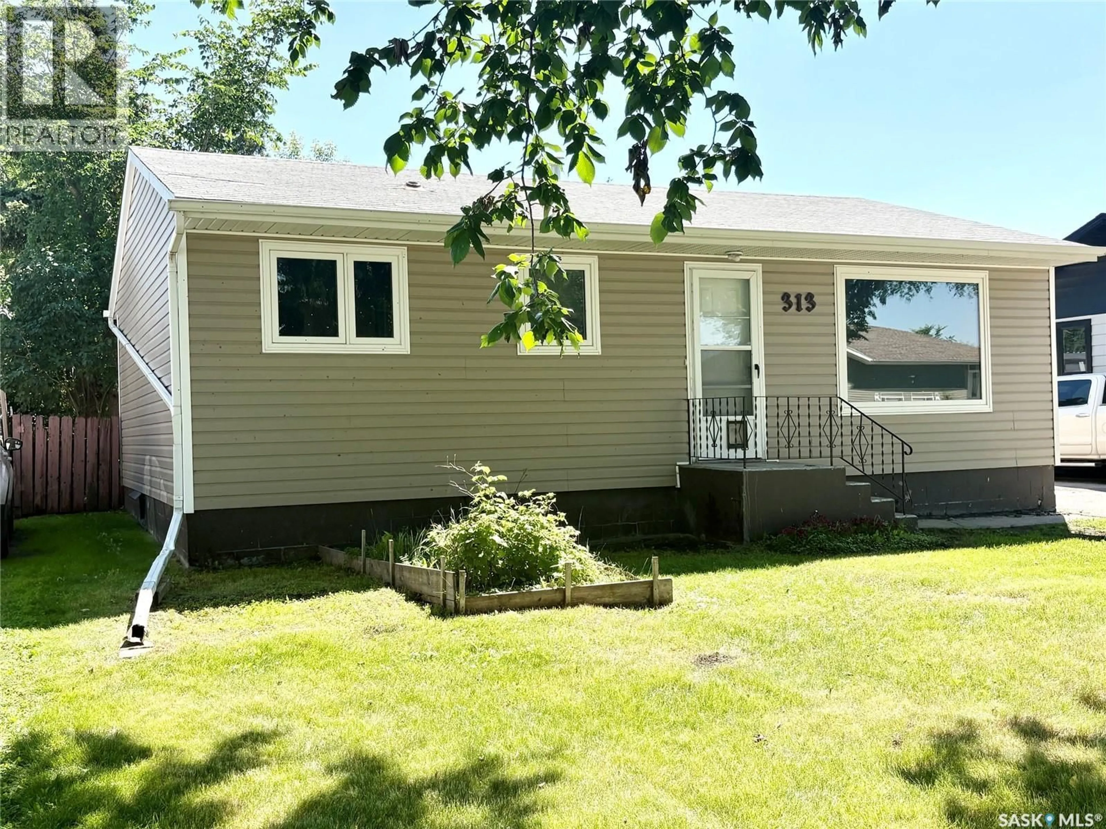 Home with vinyl exterior material, street for N - 313 MYRTLE AVENUE, Yorkton Saskatchewan S3N1R7