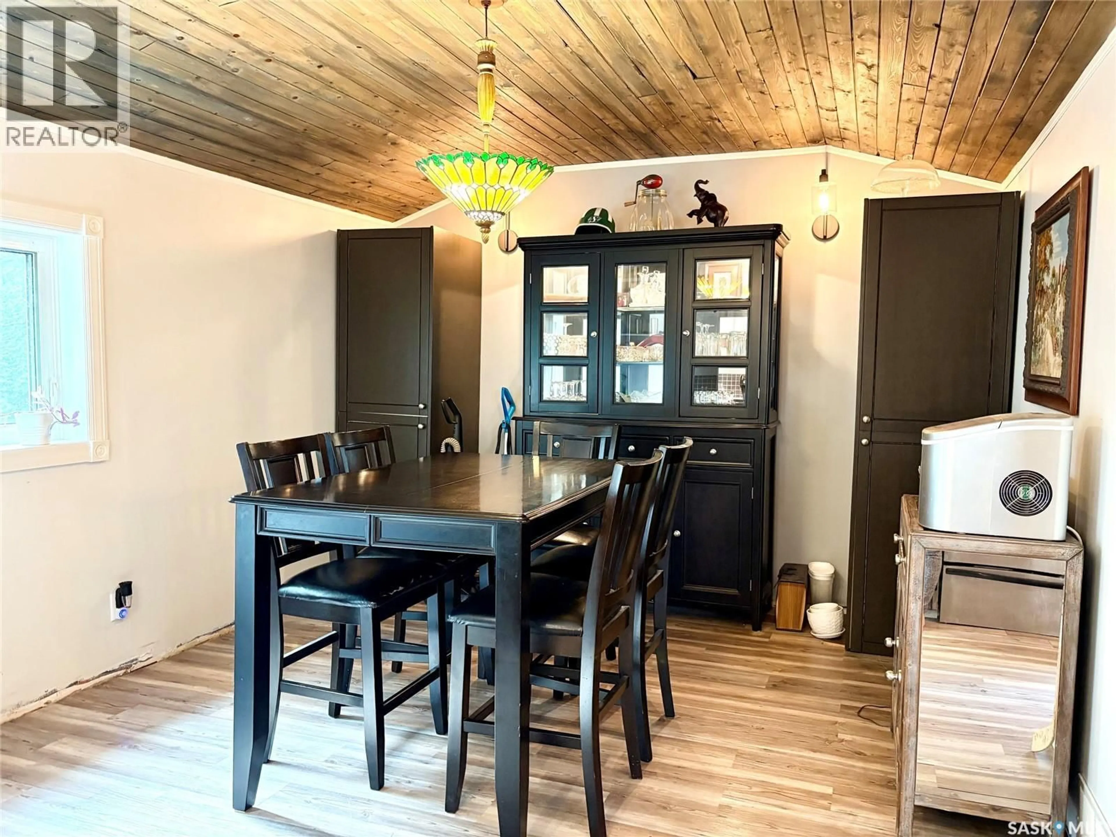 Dining room, wood/laminate floor for 67 SIXTH AVENUE, Yorkton Saskatchewan S3N0X7