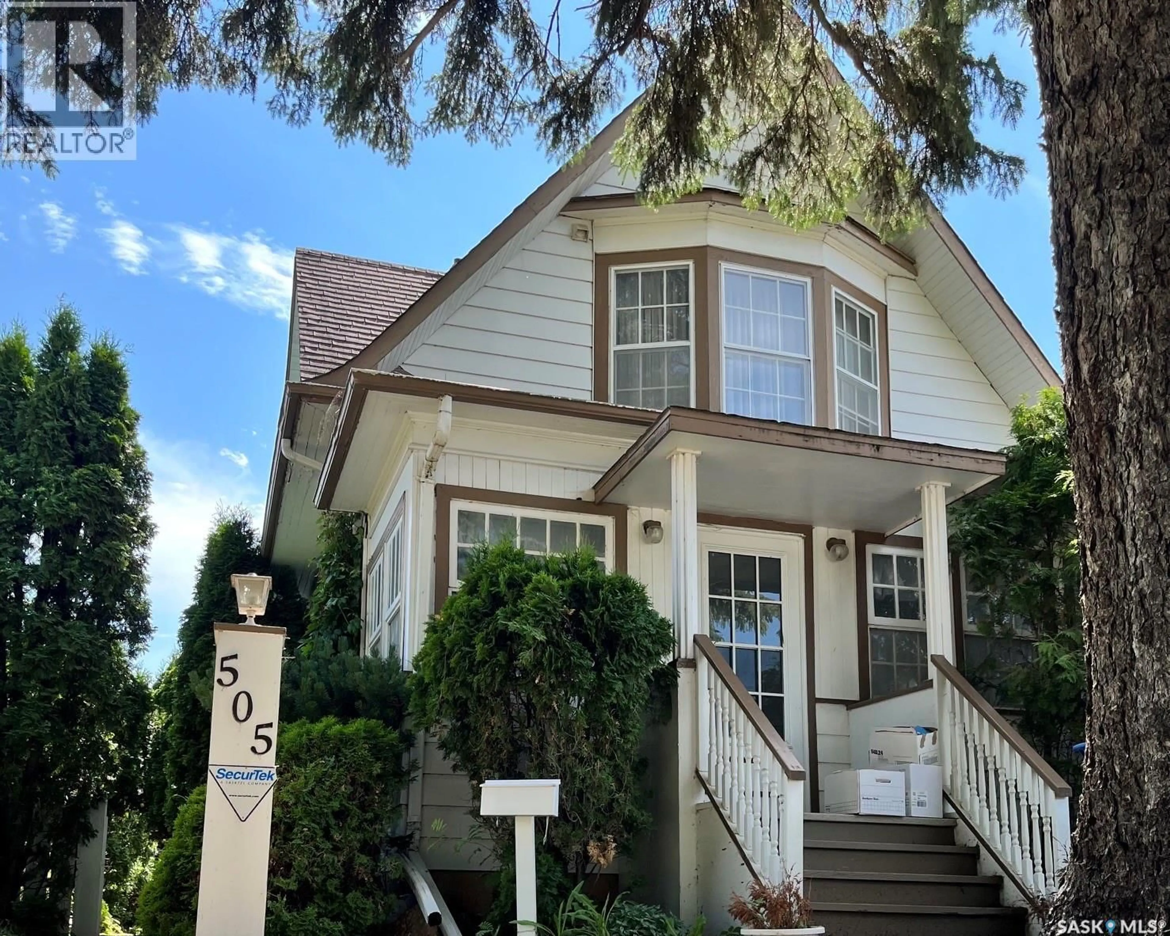 Home with vinyl exterior material, street for 505 MACLEOD AVENUE, Melfort Saskatchewan S0E1A0