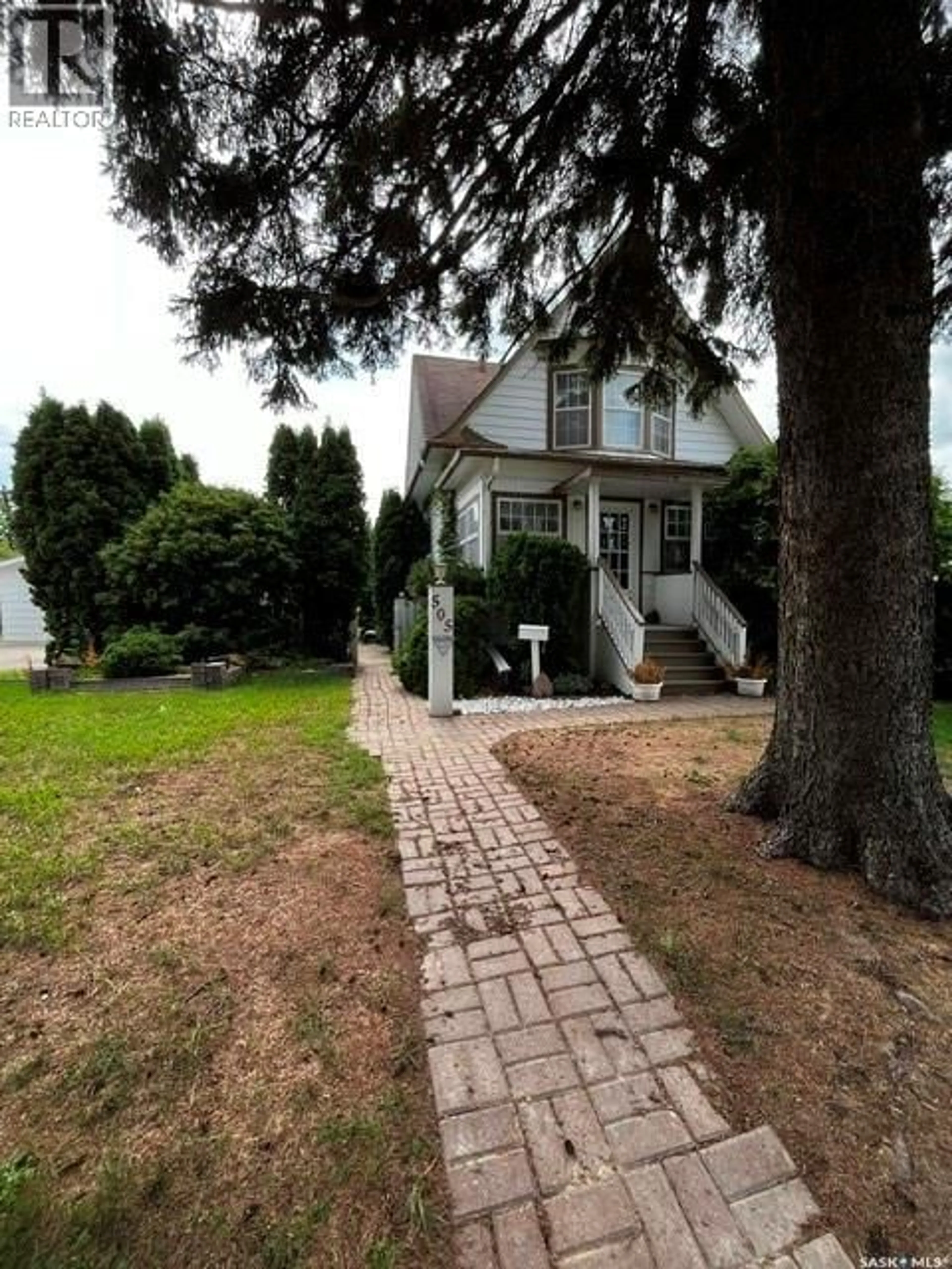 A pic from outside/outdoor area/front of a property/back of a property/a pic from drone, street for 505 MACLEOD AVENUE, Melfort Saskatchewan S0E1A0