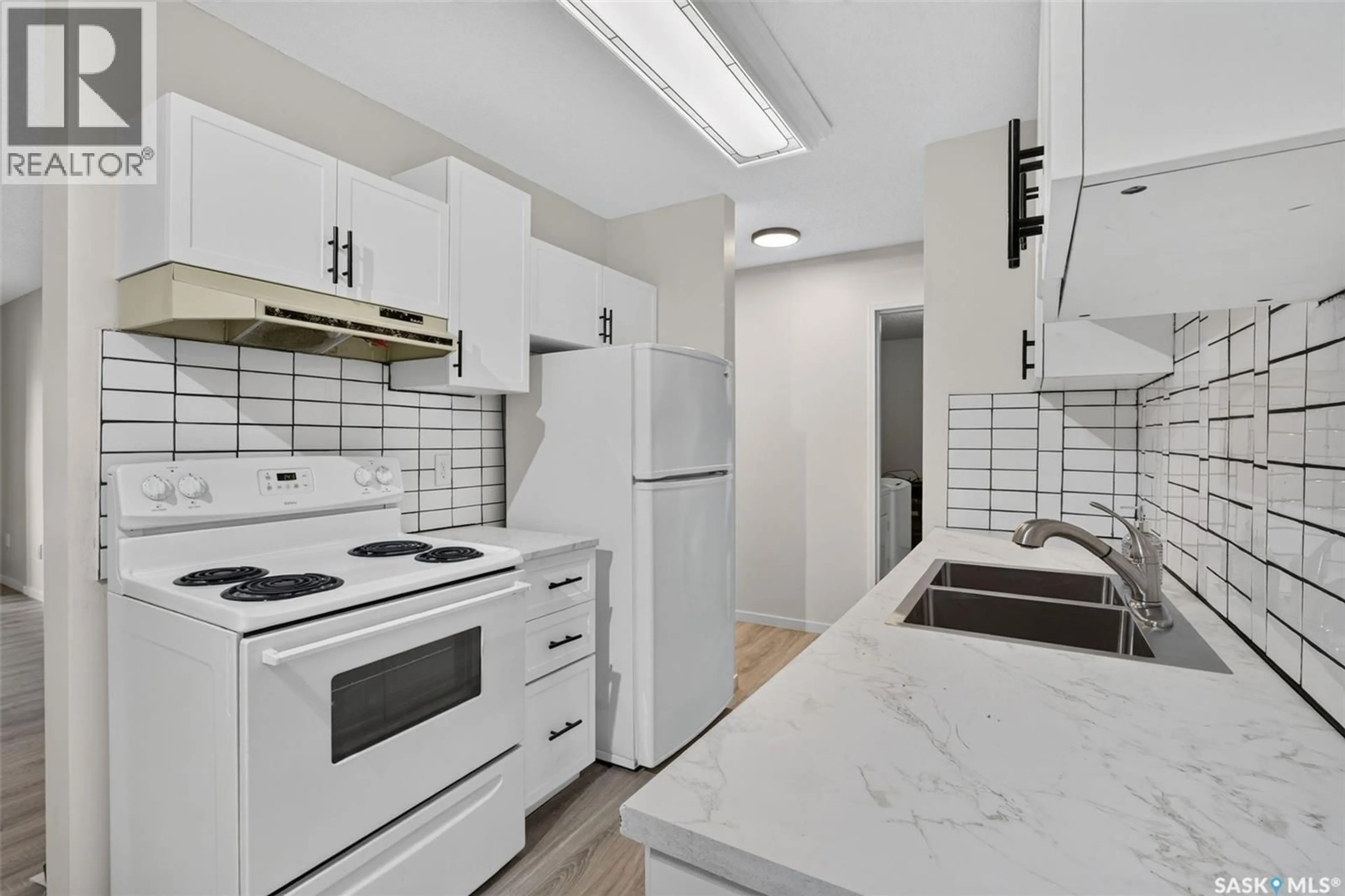 Standard kitchen, ceramic/tile floor for 407 - 1580 OLIVE DIEFENBAKER DRIVE, Prince Albert Saskatchewan S6V7M6