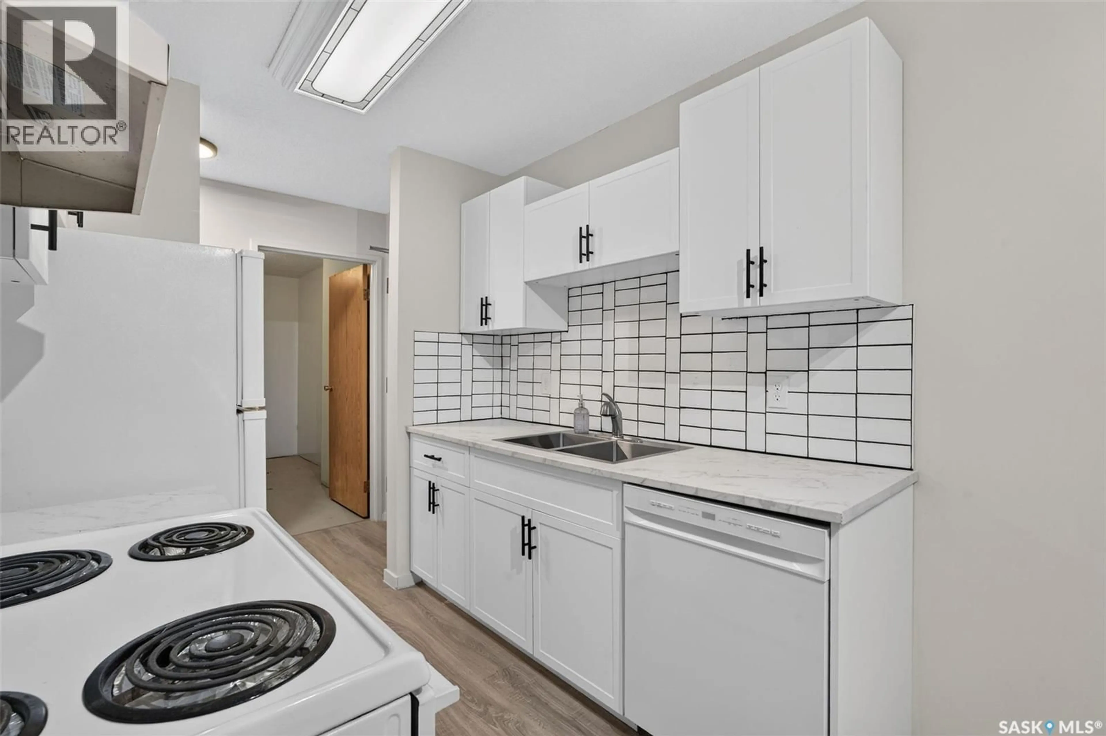 Standard kitchen, ceramic/tile floor for 407 - 1580 OLIVE DIEFENBAKER DRIVE, Prince Albert Saskatchewan S6V7M6